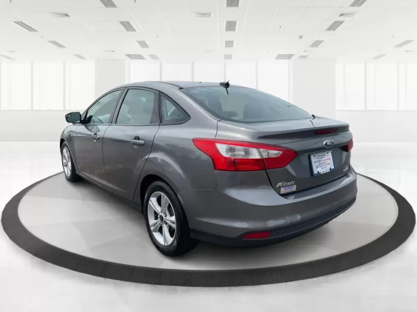 2014 Ford Focus SE (1FADP3F21EL) with an 2L I-4 gasoline direct injection engine, located at 1099 N County Rd 25A , Troy, OH, 45373, (937) 908-9800, 40.057079, -84.212883 - Photo#4