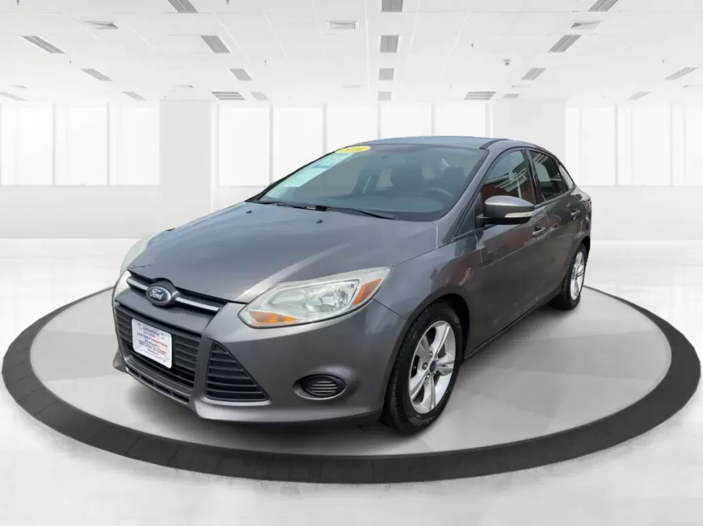 2014 Ford Focus SE (1FADP3F21EL) with an 2L I-4 gasoline direct injection engine, located at 1099 N County Rd 25A , Troy, OH, 45373, (937) 908-9800, 40.057079, -84.212883 - Photo#7