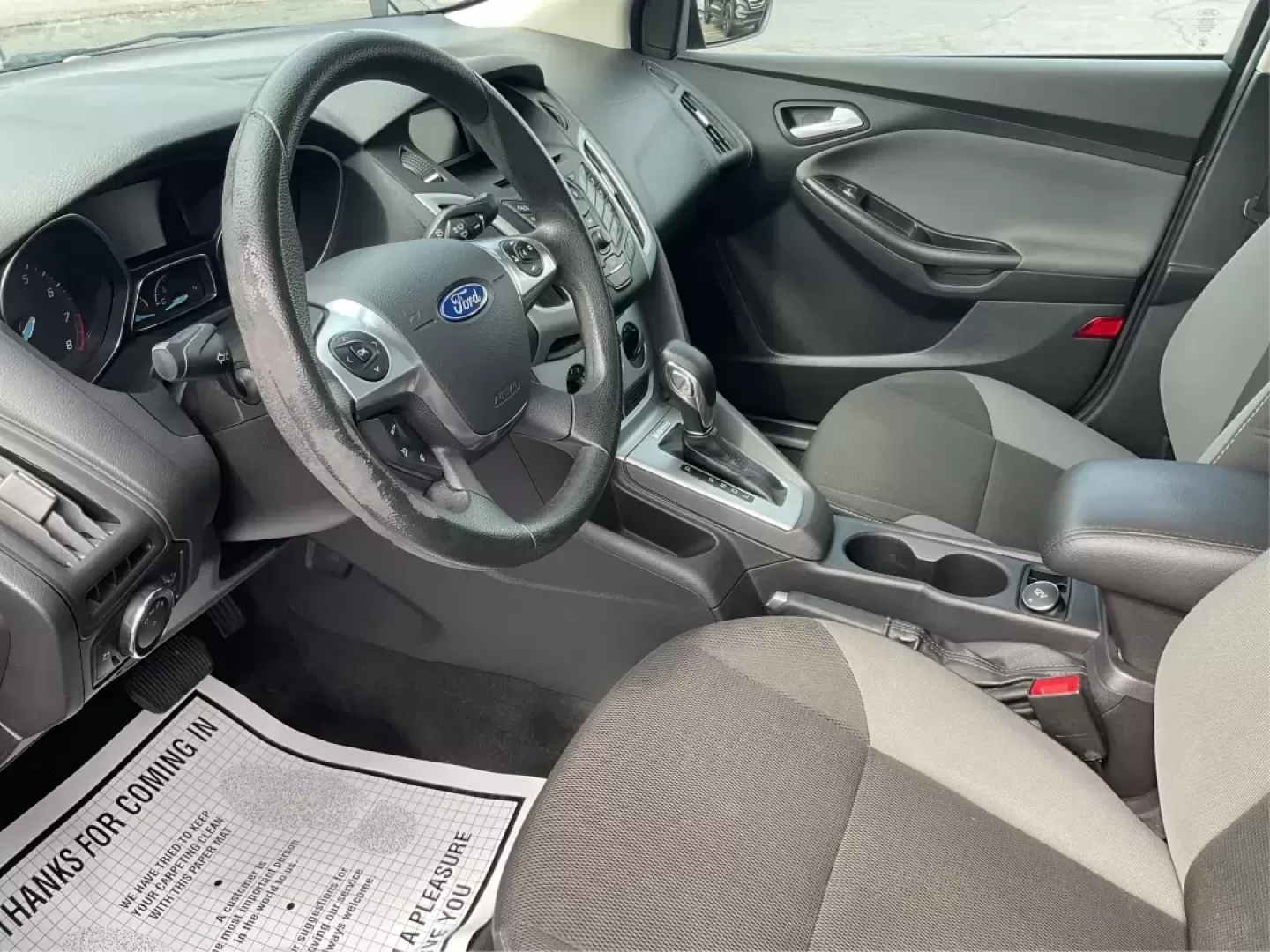 2014 Ford Focus SE (1FADP3F21EL) with an 2L I-4 gasoline direct injection engine, located at 1099 N County Rd 25A , Troy, OH, 45373, (937) 908-9800, 40.057079, -84.212883 - Photo#8