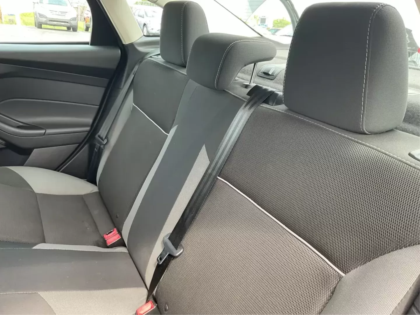 2014 Ford Focus SE (1FADP3F21EL) with an 2L I-4 gasoline direct injection engine, located at 1099 N County Rd 25A , Troy, OH, 45373, (937) 908-9800, 40.057079, -84.212883 - Photo#9