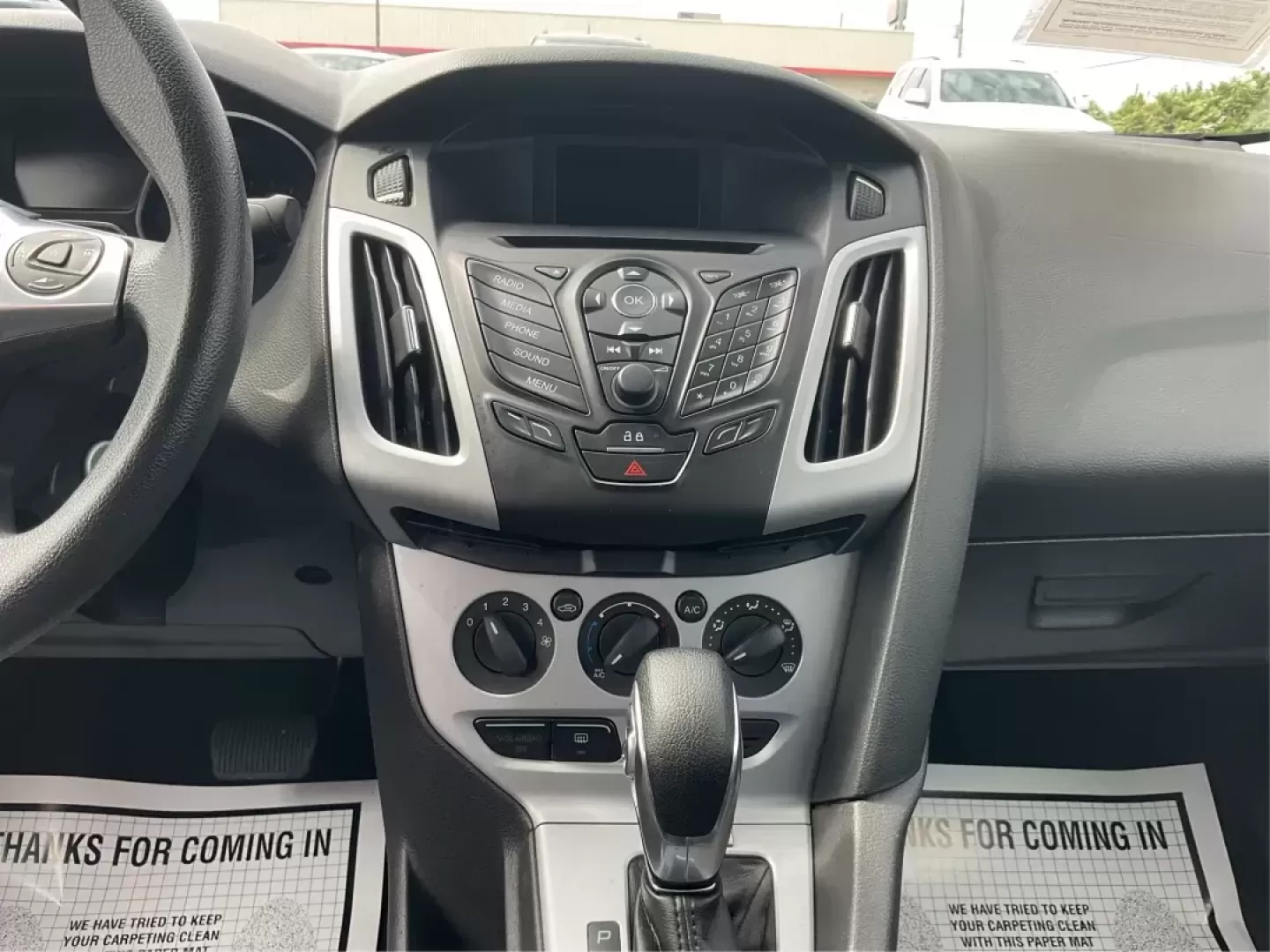 2014 Ford Focus SE (1FADP3F21EL) with an 2L I-4 gasoline direct injection engine, located at 1099 N County Rd 25A , Troy, OH, 45373, (937) 908-9800, 40.057079, -84.212883 - Photo#12