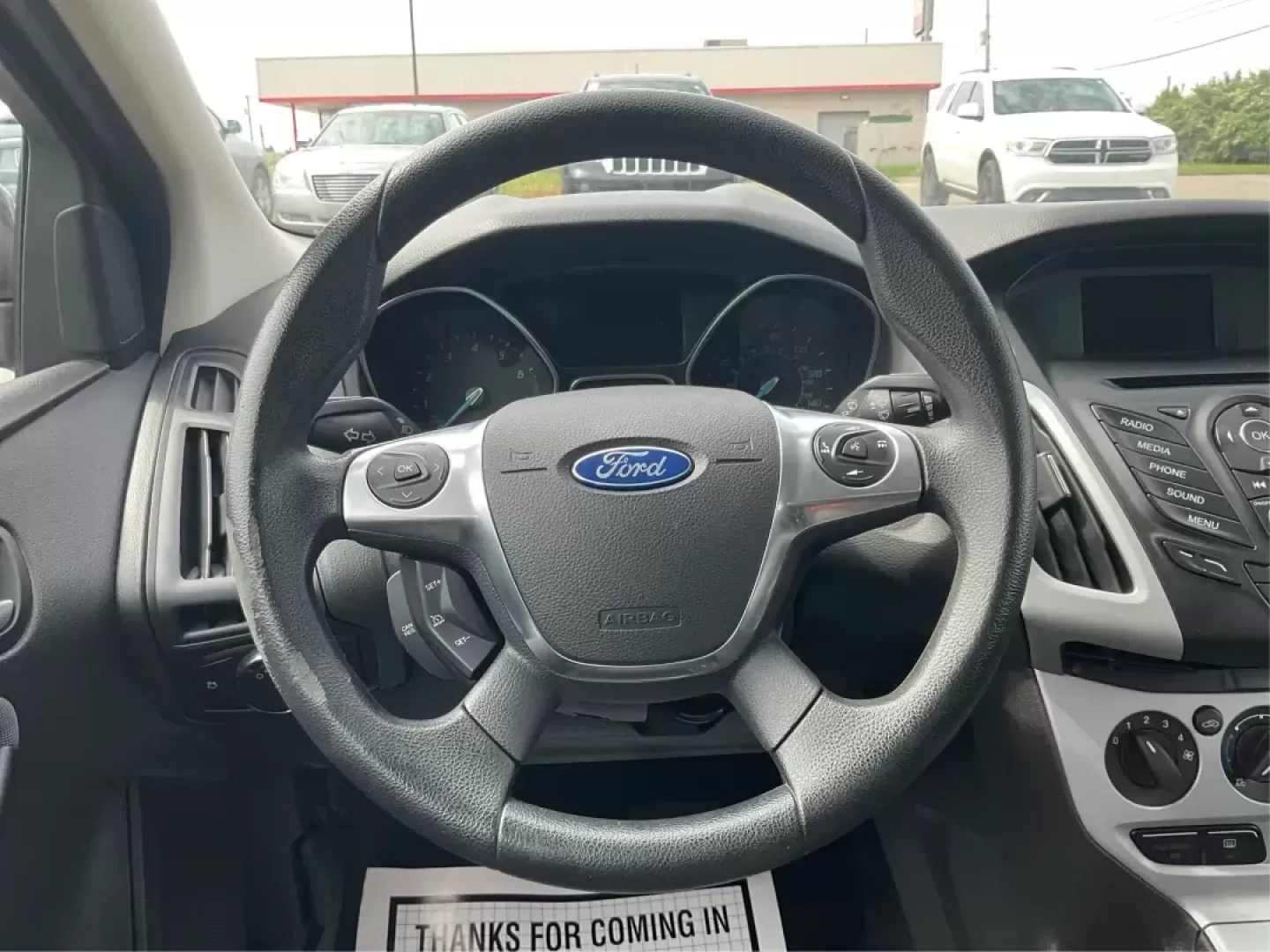 2014 Ford Focus SE (1FADP3F21EL) with an 2L I-4 gasoline direct injection engine, located at 1099 N County Rd 25A , Troy, OH, 45373, (937) 908-9800, 40.057079, -84.212883 - Photo#15