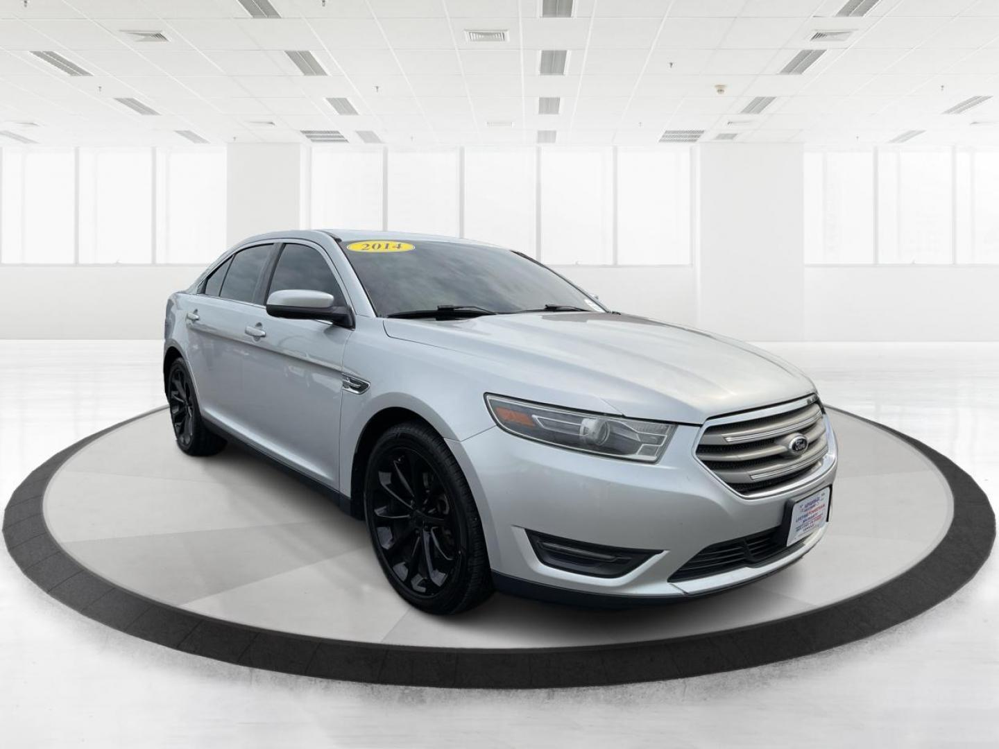 2014 Ford Taurus SEL (1FAHP2E86EG) with an EcoBoost 2L I-4 gasoline direct injection engine, located at 1099 N County Rd 25A , Troy, OH, 45373, (937) 908-9800, 40.057079, -84.212883 - Photo#0