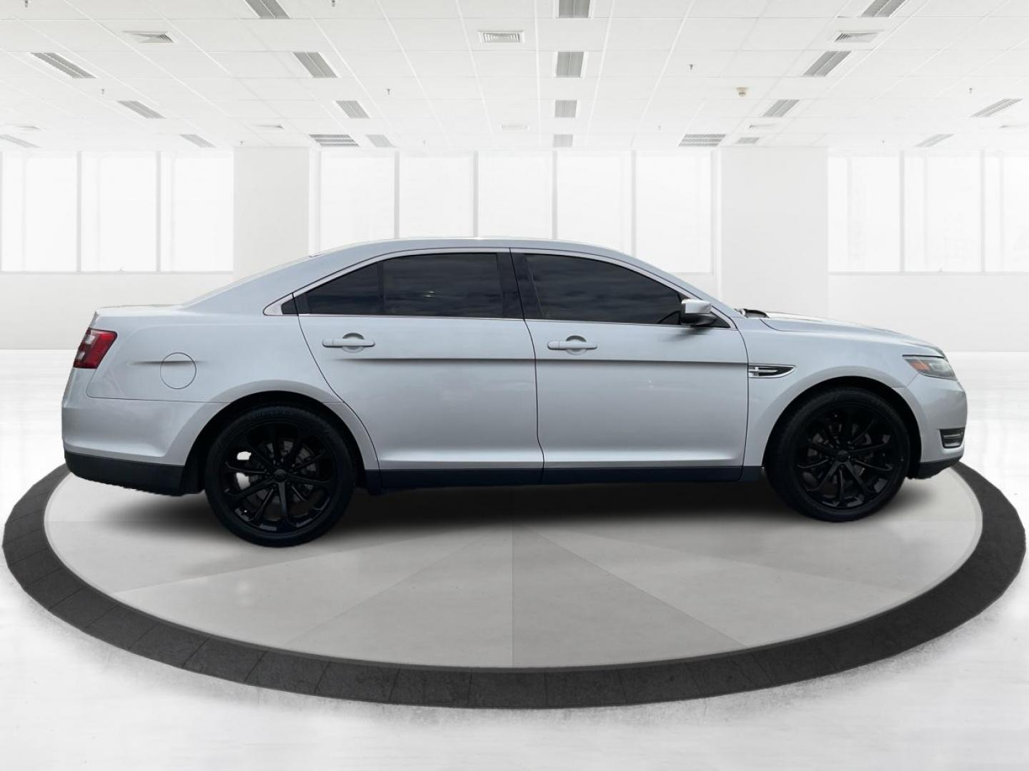 2014 Ford Taurus SEL (1FAHP2E86EG) with an EcoBoost 2L I-4 gasoline direct injection engine, located at 1099 N County Rd 25A , Troy, OH, 45373, (937) 908-9800, 40.057079, -84.212883 - Photo#1