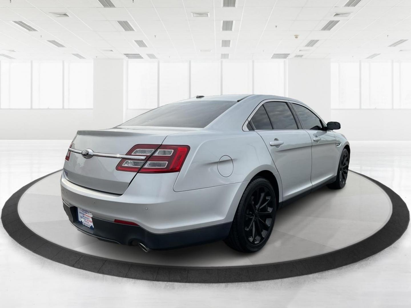 2014 Ford Taurus SEL (1FAHP2E86EG) with an EcoBoost 2L I-4 gasoline direct injection engine, located at 1099 N County Rd 25A , Troy, OH, 45373, (937) 908-9800, 40.057079, -84.212883 - Photo#2