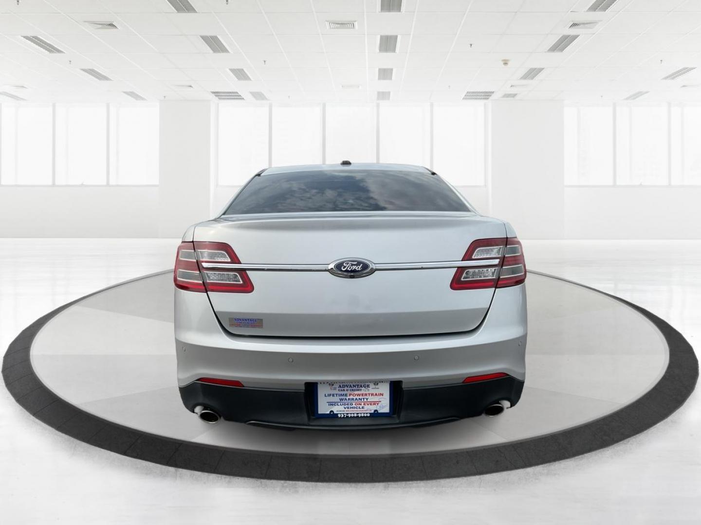 2014 Ford Taurus SEL (1FAHP2E86EG) with an EcoBoost 2L I-4 gasoline direct injection engine, located at 1099 N County Rd 25A , Troy, OH, 45373, (937) 908-9800, 40.057079, -84.212883 - Photo#4