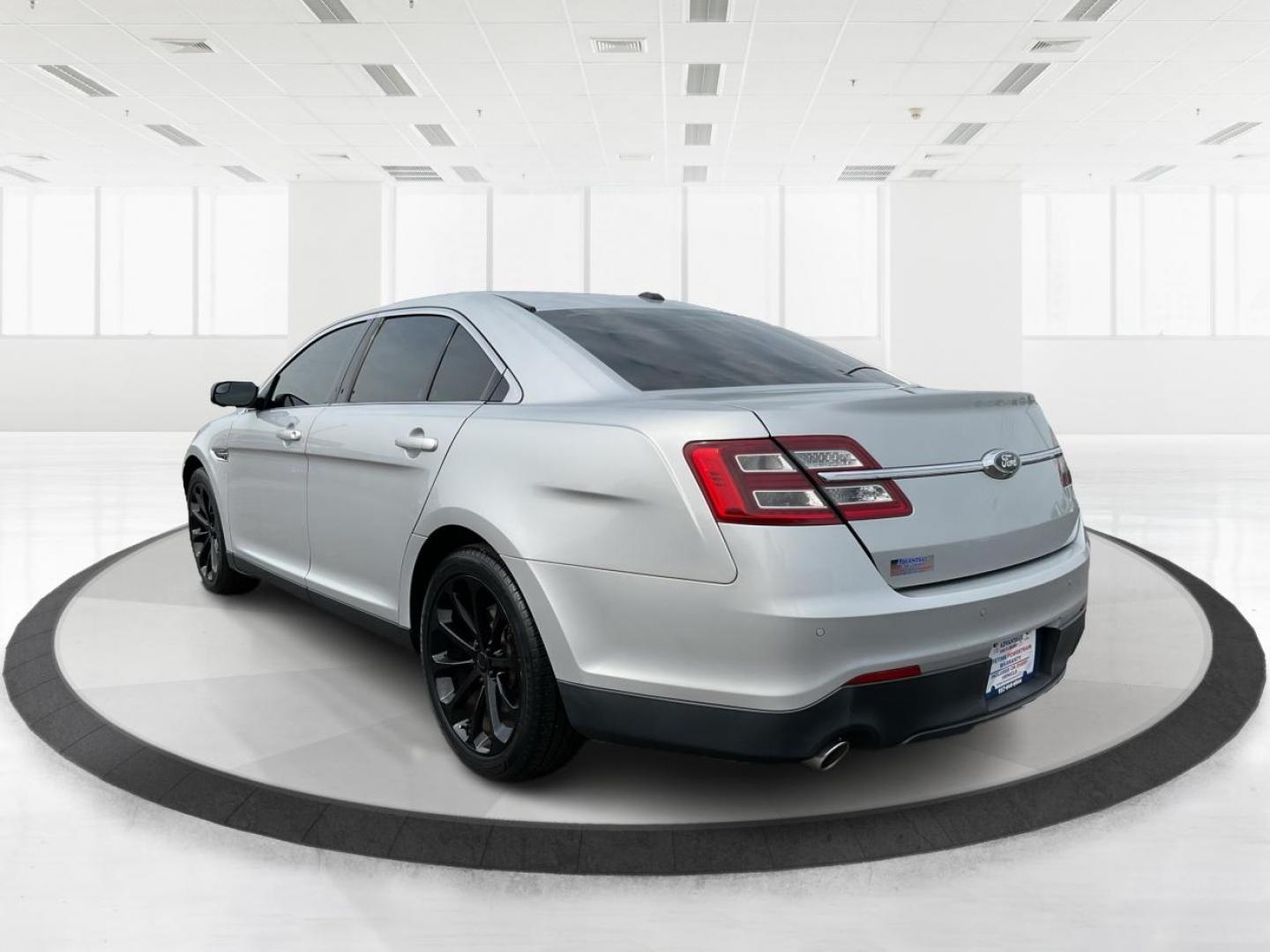 2014 Ford Taurus SEL (1FAHP2E86EG) with an EcoBoost 2L I-4 gasoline direct injection engine, located at 1099 N County Rd 25A , Troy, OH, 45373, (937) 908-9800, 40.057079, -84.212883 - Photo#5