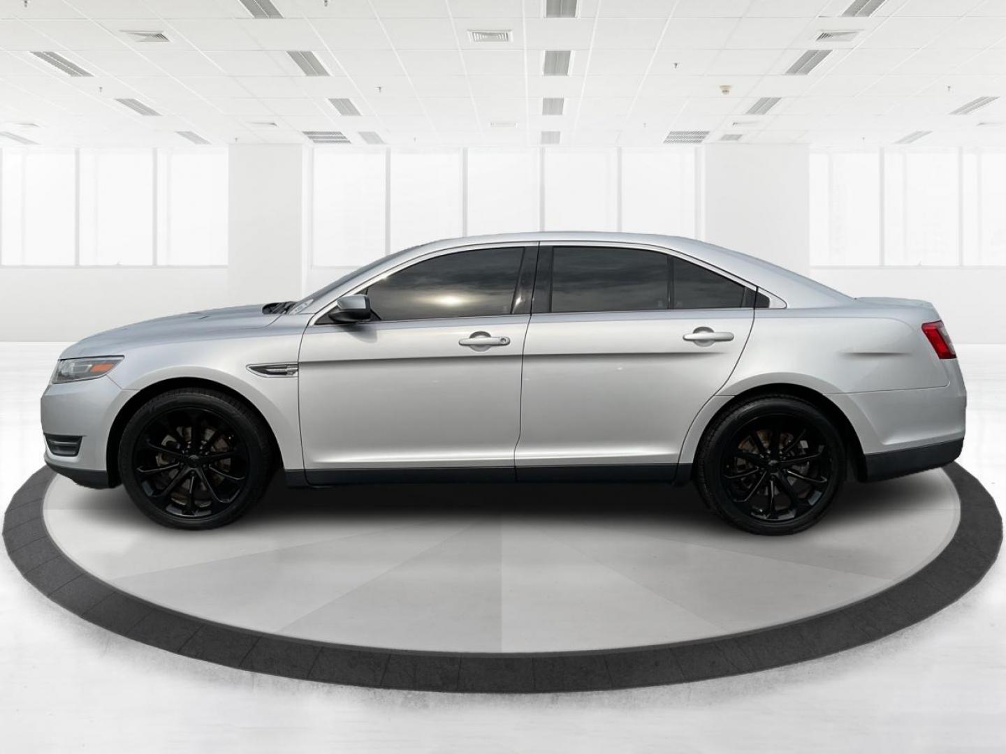 2014 Ford Taurus SEL (1FAHP2E86EG) with an EcoBoost 2L I-4 gasoline direct injection engine, located at 1099 N County Rd 25A , Troy, OH, 45373, (937) 908-9800, 40.057079, -84.212883 - Photo#6