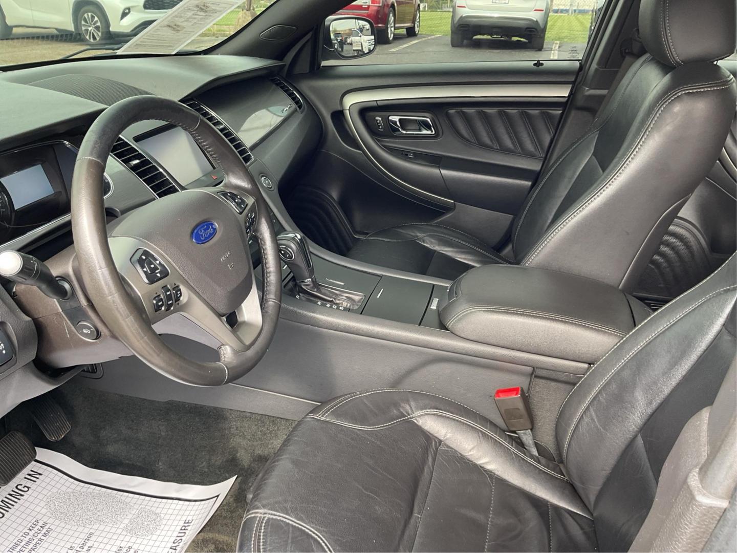 2014 Ford Taurus SEL (1FAHP2E86EG) with an EcoBoost 2L I-4 gasoline direct injection engine, located at 1099 N County Rd 25A , Troy, OH, 45373, (937) 908-9800, 40.057079, -84.212883 - Photo#9