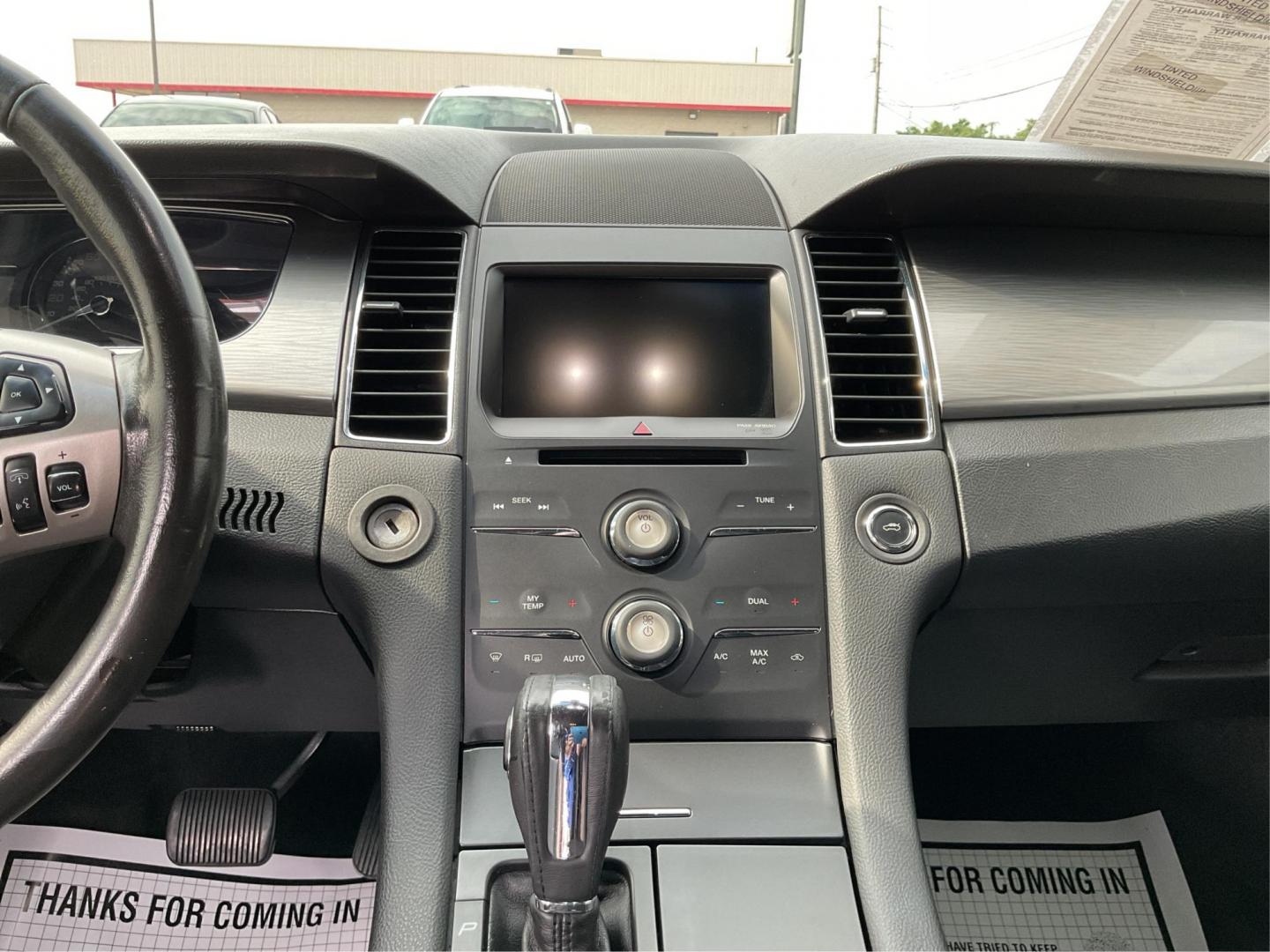 2014 Ford Taurus SEL (1FAHP2E86EG) with an EcoBoost 2L I-4 gasoline direct injection engine, located at 1099 N County Rd 25A , Troy, OH, 45373, (937) 908-9800, 40.057079, -84.212883 - Photo#13