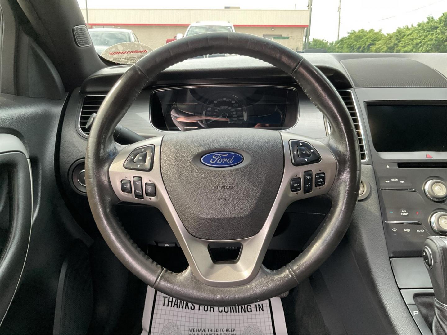 2014 Ford Taurus SEL (1FAHP2E86EG) with an EcoBoost 2L I-4 gasoline direct injection engine, located at 1099 N County Rd 25A , Troy, OH, 45373, (937) 908-9800, 40.057079, -84.212883 - Photo#16
