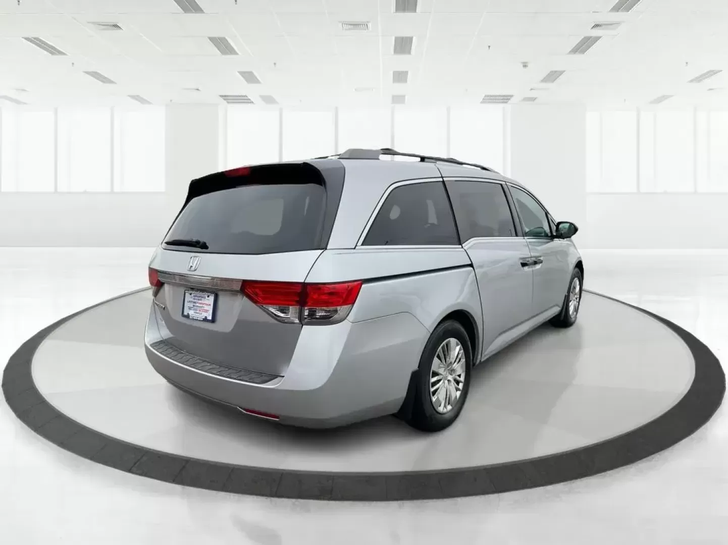 2014 Honda Odyssey LX (5FNRL5H23EB) with an 3.5L V-6 i-VTEC variable valve control engine, located at 1230 East Main St, Xenia, OH, 45385, (937) 908-9800, 39.688026, -83.910172 - Photo#2