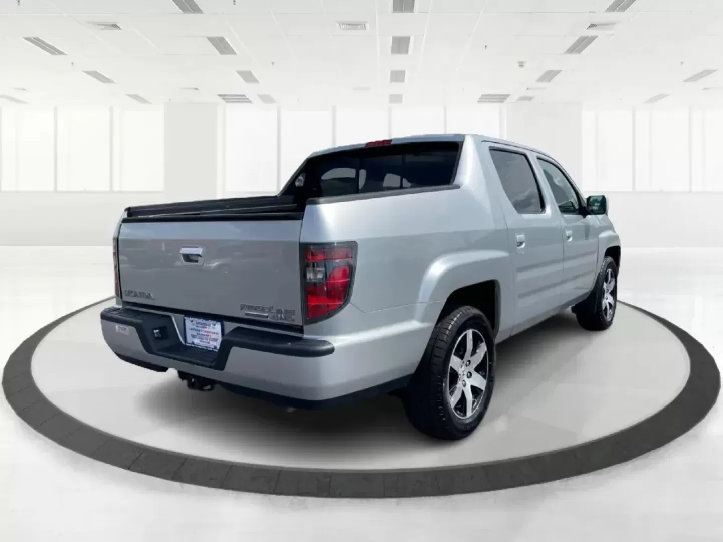 2014 Honda Ridgeline RTL-S (5FPYK1F67EB) with an 3.5L V6 SOHC 24V engine, 5-Speed Automatic transmission, located at 1230 East Main St, Xenia, OH, 45385, (937) 908-9800, 39.688026, -83.910172 - Photo#1
