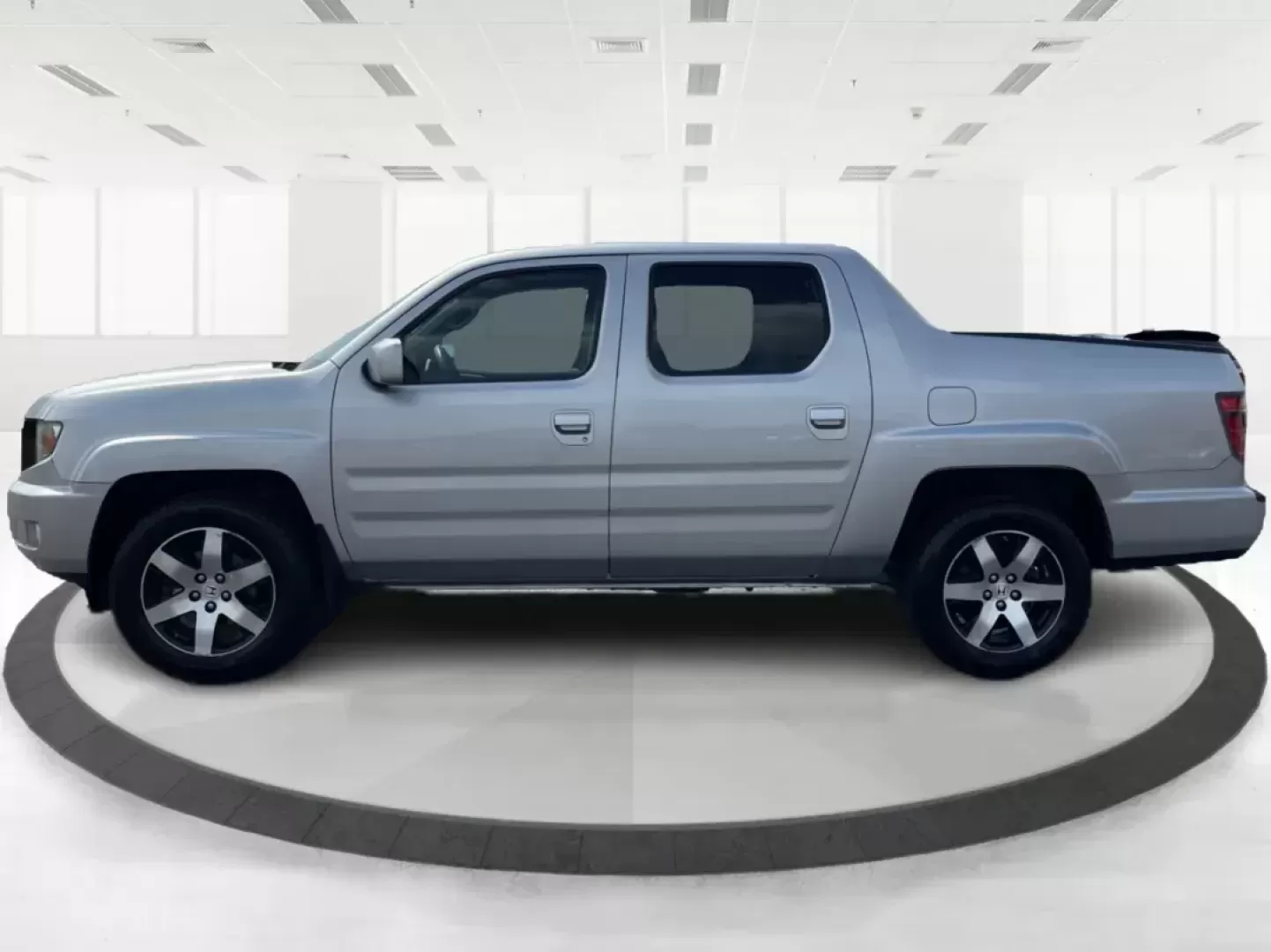 2014 Honda Ridgeline RTL-S (5FPYK1F67EB) with an 3.5L V6 SOHC 24V engine, 5-Speed Automatic transmission, located at 1230 East Main St, Xenia, OH, 45385, (937) 908-9800, 39.688026, -83.910172 - Photo#5