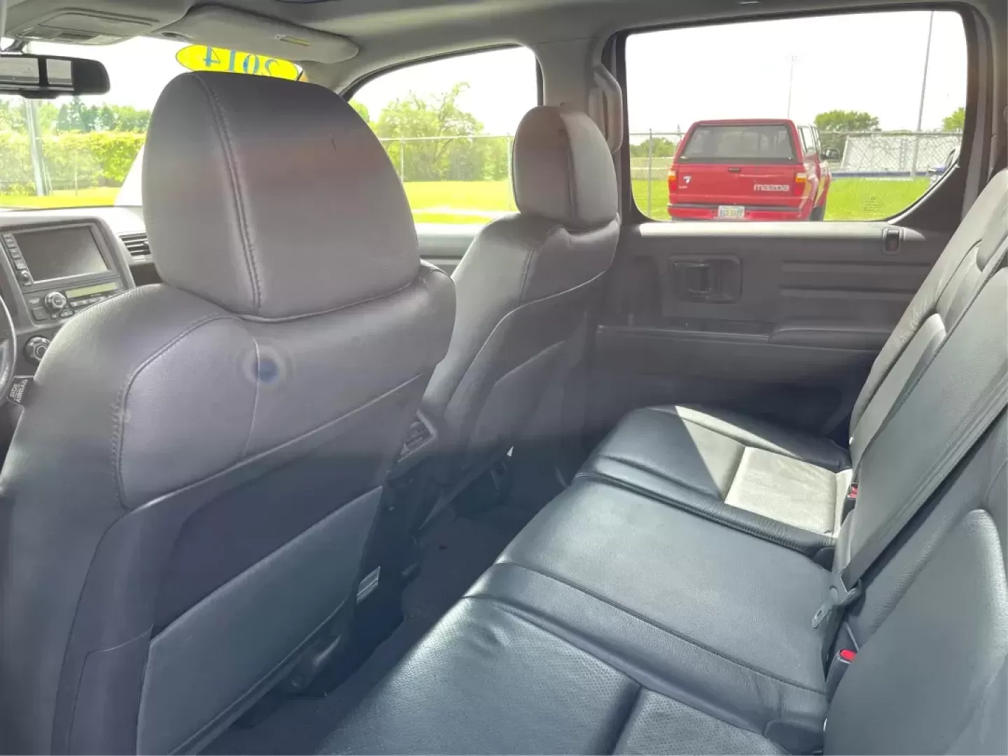 2014 Honda Ridgeline RTL-S (5FPYK1F67EB) with an 3.5L V6 SOHC 24V engine, 5-Speed Automatic transmission, located at 1230 East Main St, Xenia, OH, 45385, (937) 908-9800, 39.688026, -83.910172 - Photo#9