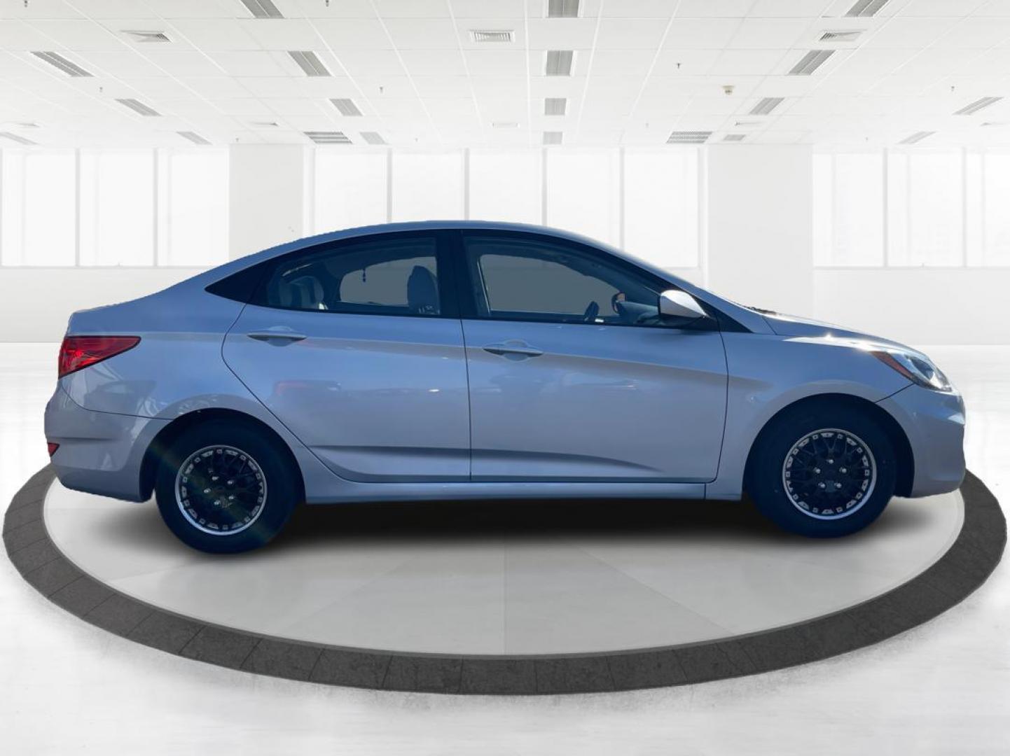 2014 Hyundai Accent GLS 4-Door (KMHCT4AE0EU) with an 1.6L L4 DOHC 16V engine, located at 8750 N County Rd 25A, Piqua, OH, 45356, (937) 908-9800, 40.164391, -84.232513 - Photo#1