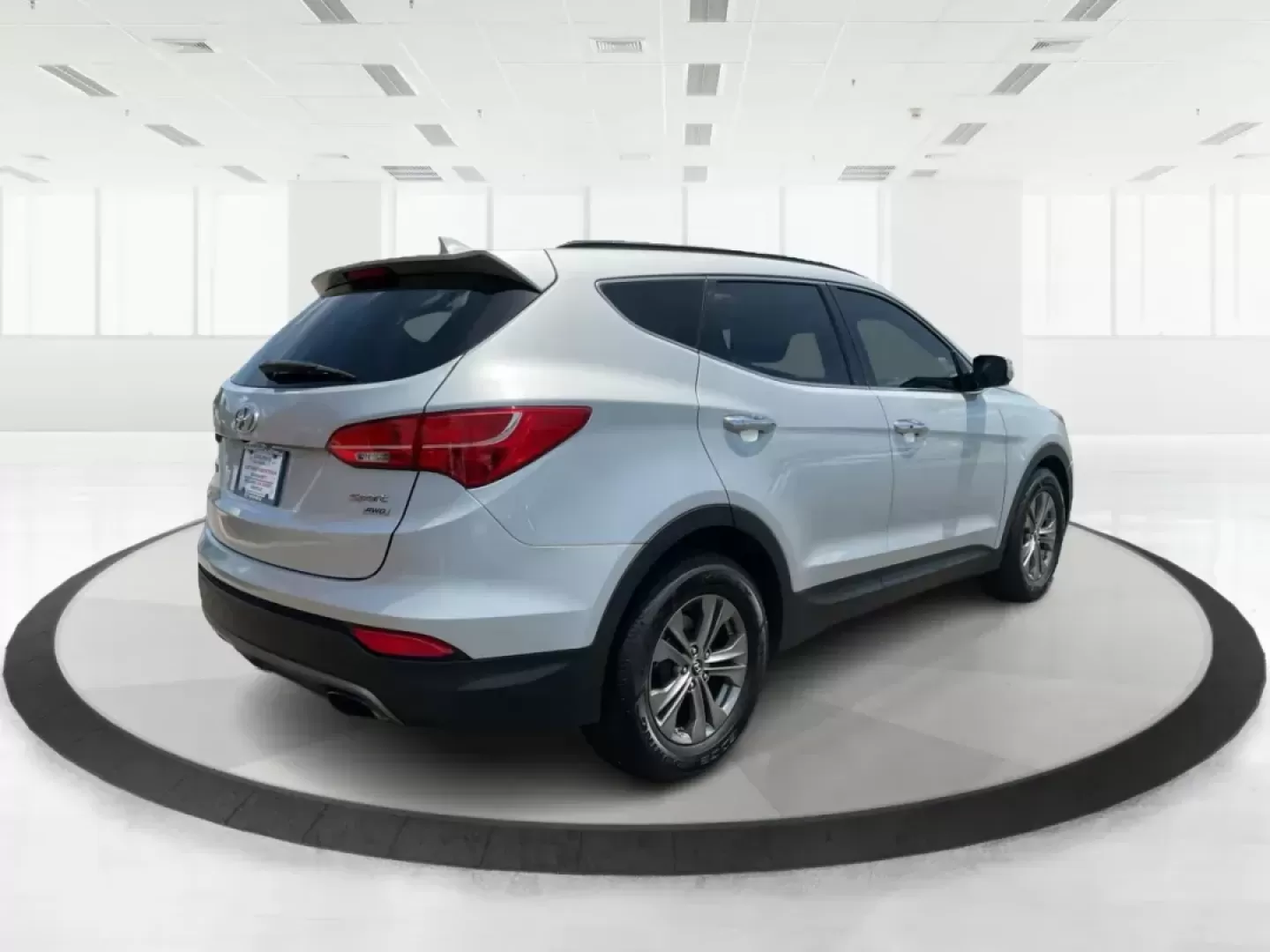 2014 Moonstone Silver Hyundai Santa Fe Sport 2.4 AWD (5XYZUDLB6EG) with an 2.4L L4 DOHC 16V engine, 6-Speed Automatic transmission, located at 8750 N County Rd 25A, Piqua, OH, 45356, (937) 908-9800, 40.164391, -84.232513 - Photo#2