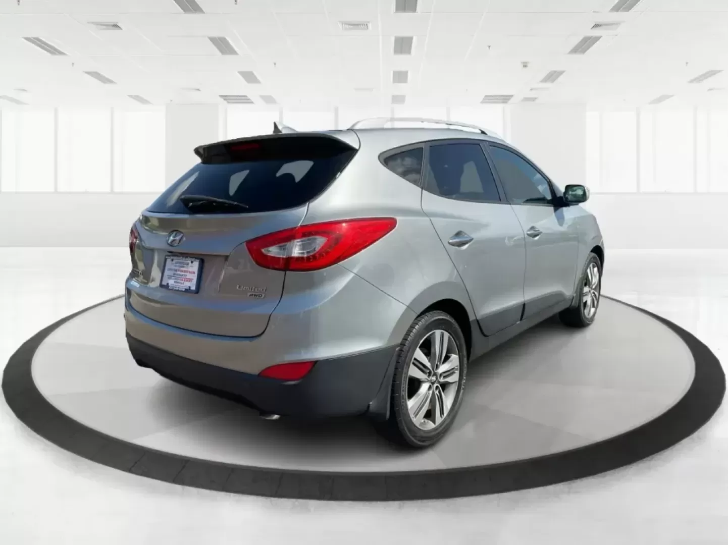 2014 Hyundai Tucson Limited (KM8JUCAG9EU) with an Theta II 2.4L I-4 gasoline direct injection engine, located at 8750 N County Rd 25A, Piqua, OH, 45356, (937) 908-9800, 40.164391, -84.232513 - Photo#1