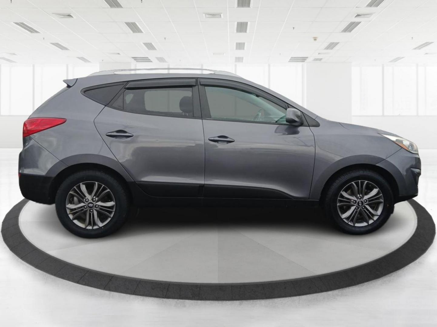2014 Hyundai Tucson GLS AWD (KM8JUCAGXEU) with an 2.4L L4 DOHC 16V engine, 6-Speed Automatic transmission, located at 880 E. National Road, Vandalia, OH, 45377, (937) 908-9800, 39.891918, -84.183594 - Photo#1