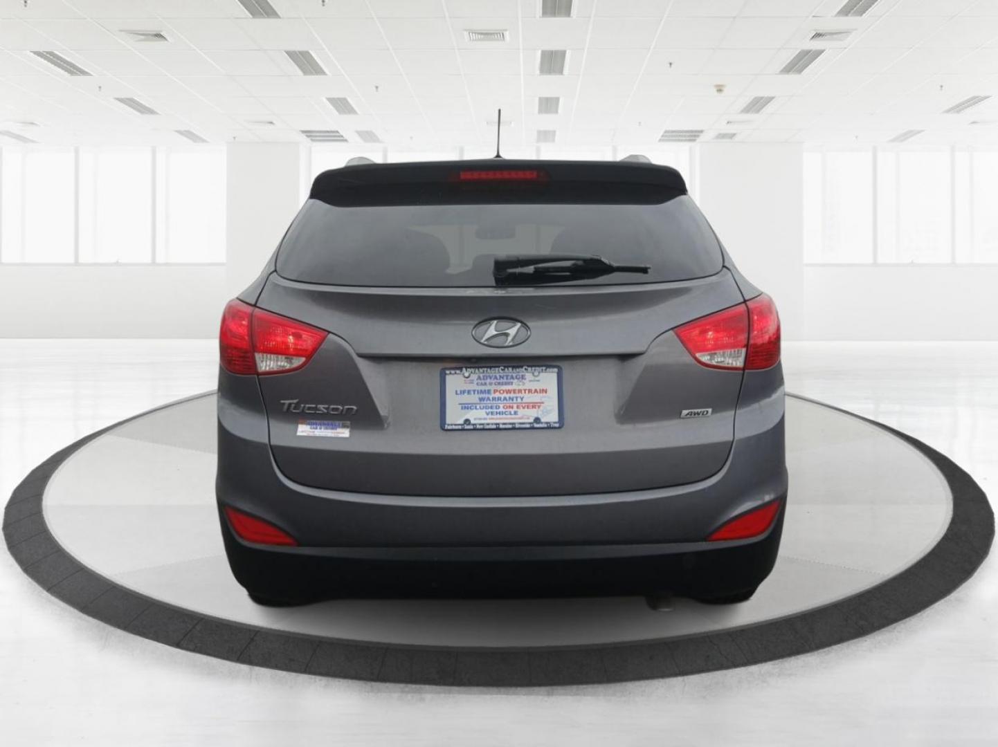 2014 Hyundai Tucson GLS AWD (KM8JUCAGXEU) with an 2.4L L4 DOHC 16V engine, 6-Speed Automatic transmission, located at 880 E. National Road, Vandalia, OH, 45377, (937) 908-9800, 39.891918, -84.183594 - Photo#3
