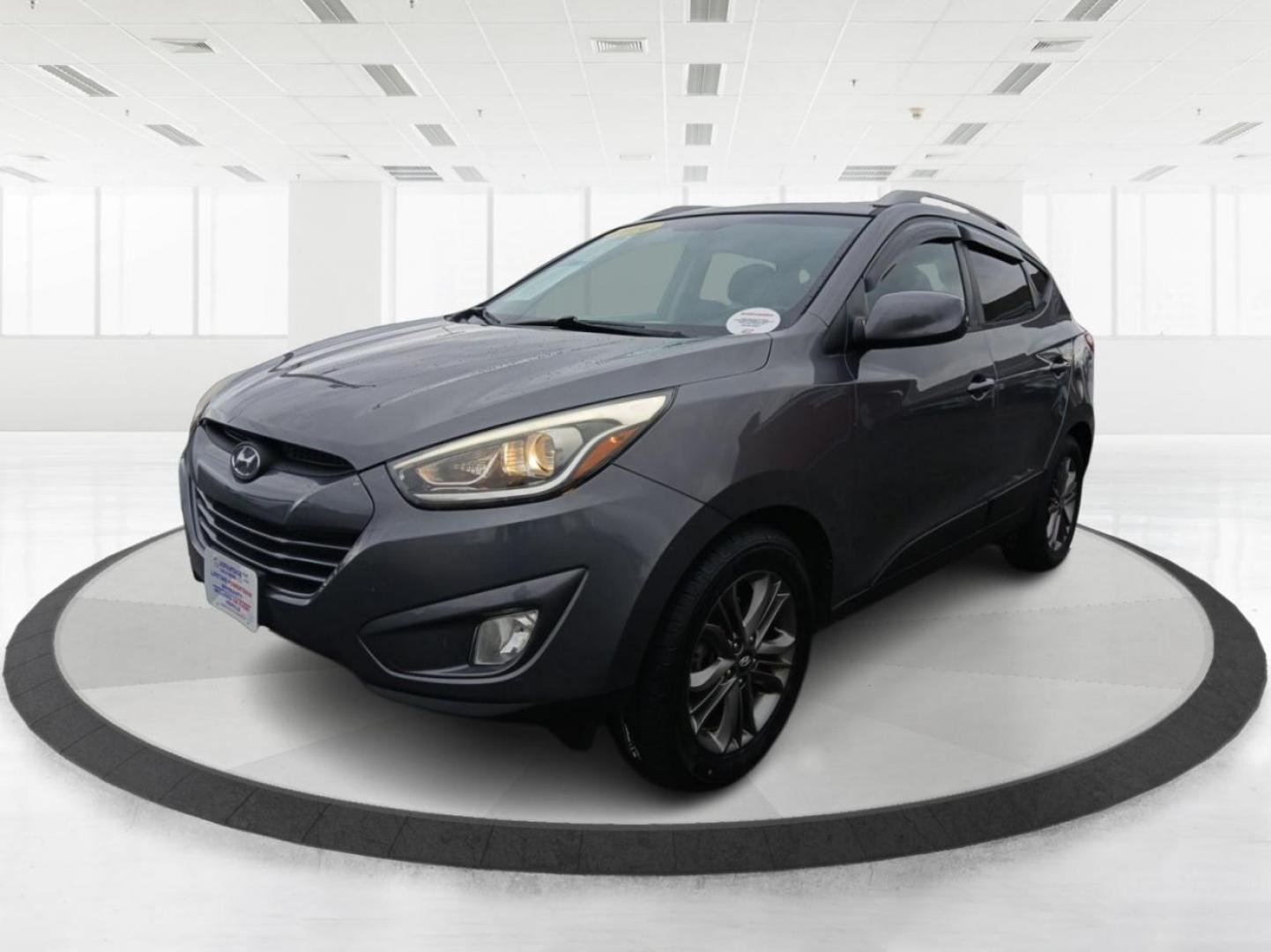 2014 Hyundai Tucson GLS AWD (KM8JUCAGXEU) with an 2.4L L4 DOHC 16V engine, 6-Speed Automatic transmission, located at 880 E. National Road, Vandalia, OH, 45377, (937) 908-9800, 39.891918, -84.183594 - Photo#7