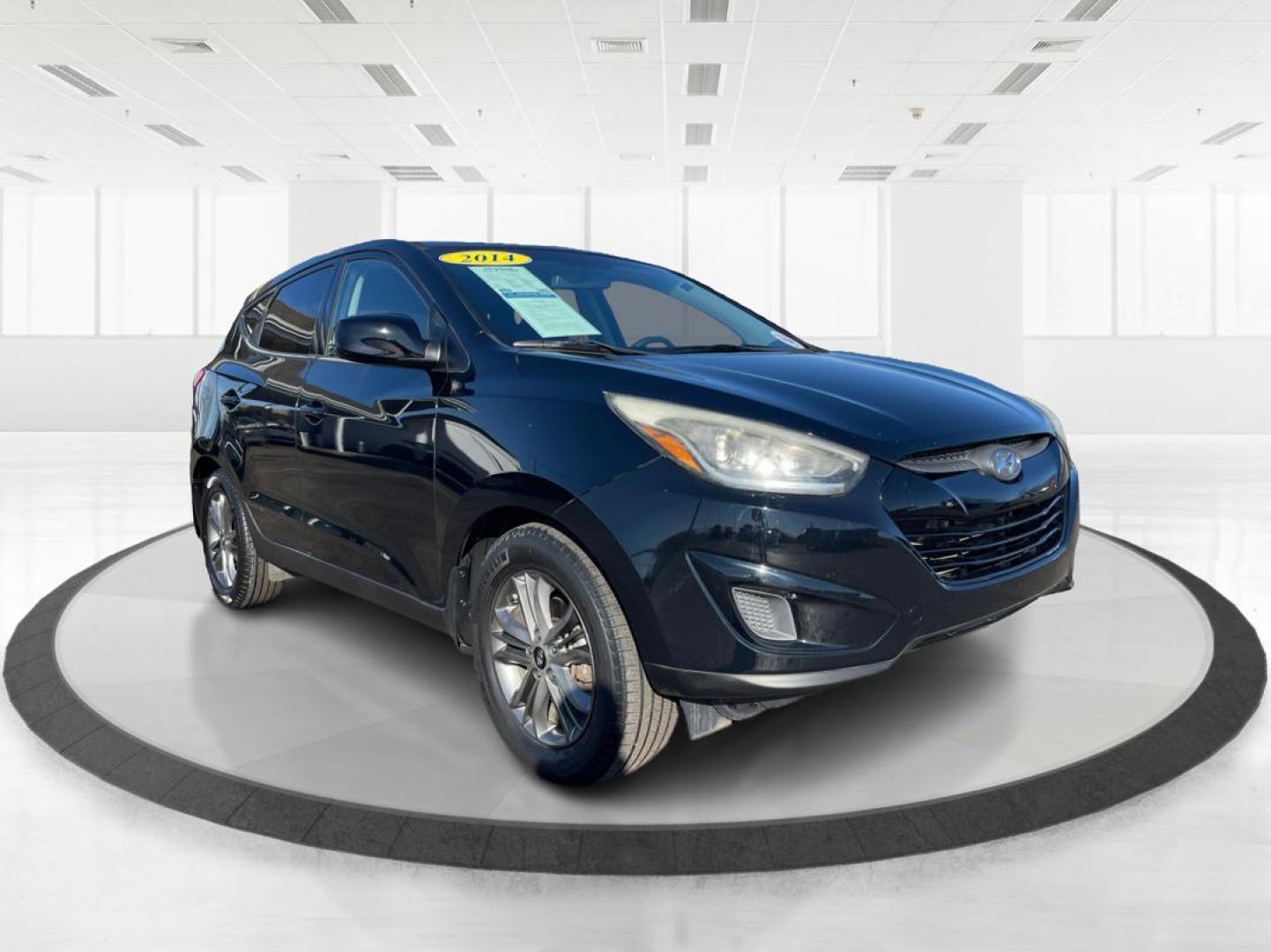 2014 Black Hyundai Tucson GL Auto AWD (KM8JTCAF0EU) with an 2.0L L4 DOHC 16V engine, 6-Speed Automatic transmission, located at 1230 East Main St, Xenia, OH, 45385, (937) 908-9800, 39.688026, -83.910172 - Photo#0