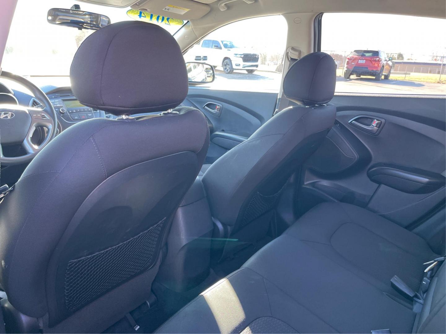 2014 Black Hyundai Tucson GL Auto AWD (KM8JTCAF0EU) with an 2.0L L4 DOHC 16V engine, 6-Speed Automatic transmission, located at 1230 East Main St, Xenia, OH, 45385, (937) 908-9800, 39.688026, -83.910172 - Photo#9