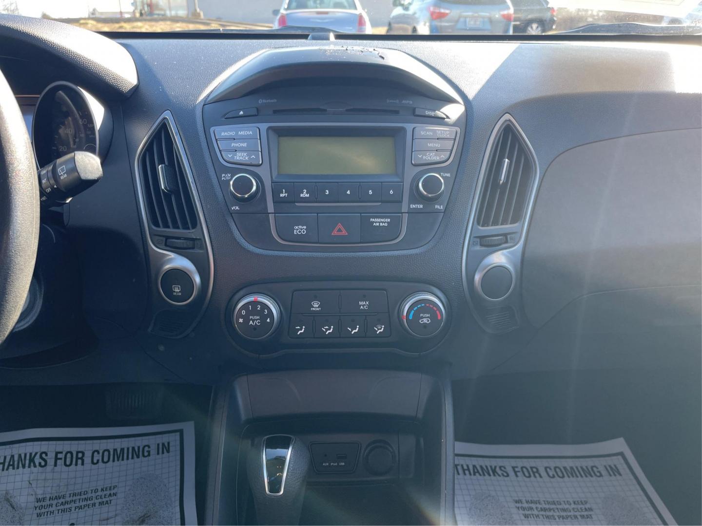 2014 Black Hyundai Tucson GL Auto AWD (KM8JTCAF0EU) with an 2.0L L4 DOHC 16V engine, 6-Speed Automatic transmission, located at 1230 East Main St, Xenia, OH, 45385, (937) 908-9800, 39.688026, -83.910172 - Photo#12