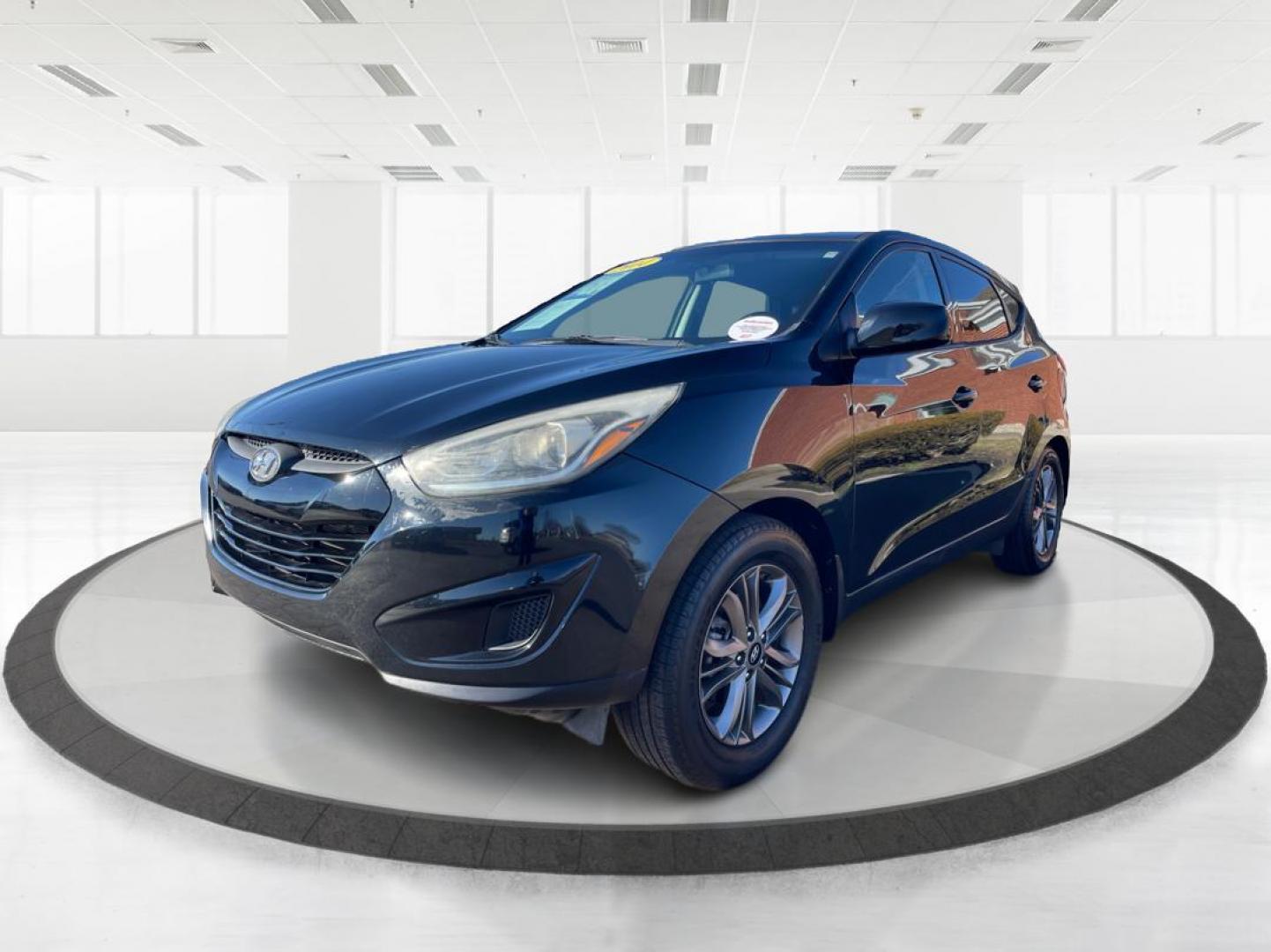 2014 Black Hyundai Tucson GL Auto AWD (KM8JTCAF0EU) with an 2.0L L4 DOHC 16V engine, 6-Speed Automatic transmission, located at 1230 East Main St, Xenia, OH, 45385, (937) 908-9800, 39.688026, -83.910172 - Photo#7