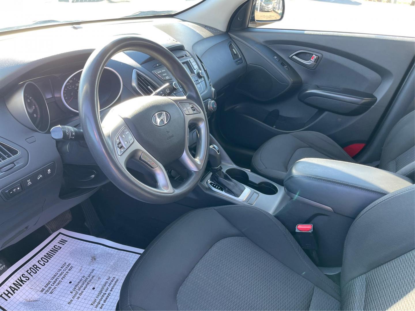 2014 Black Hyundai Tucson GL Auto AWD (KM8JTCAF0EU) with an 2.0L L4 DOHC 16V engine, 6-Speed Automatic transmission, located at 1230 East Main St, Xenia, OH, 45385, (937) 908-9800, 39.688026, -83.910172 - Photo#8