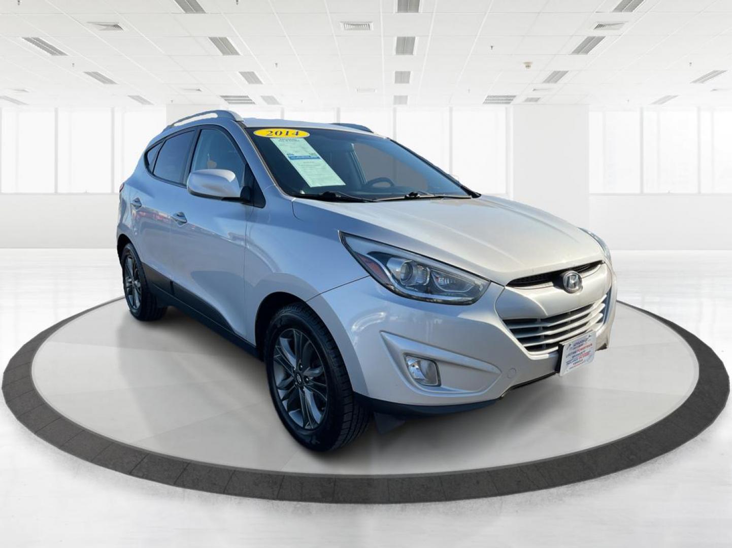 2014 Hyundai Tucson SE (KM8JUCAG8EU) with an Theta II 2.4L I-4 gasoline direct injection engine, located at 1230 East Main St, Xenia, OH, 45385, (937) 908-9800, 39.688026, -83.910172 - Photo#0