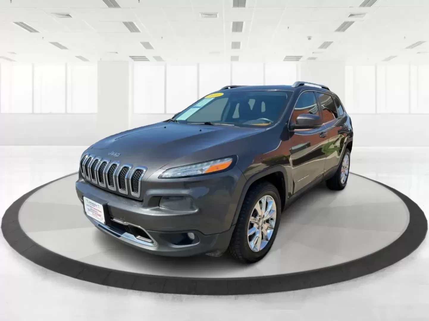 2014 Jeep Cherokee Limited 4WD (1C4PJMDBXEW) with an 2.4L L4 DOHC 16V engine, 9-Speed Automatic transmission, located at 880 E. National Road, Vandalia, OH, 45377, (937) 908-9800, 39.891918, -84.183594 - Photo#7