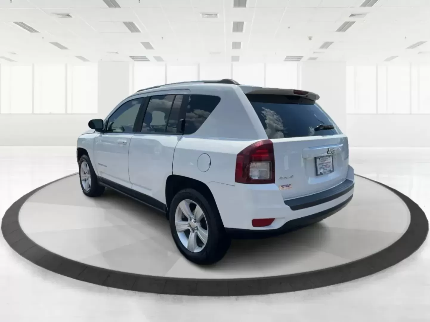 2014 Jeep Compass Sport (1C4NJDBB6ED) with an 2.4L I-4 DOHC engine, located at 401 Woodman Dr, Riverside, OH, 45431, (937) 908-9800, 39.760899, -84.123421 - Photo#4