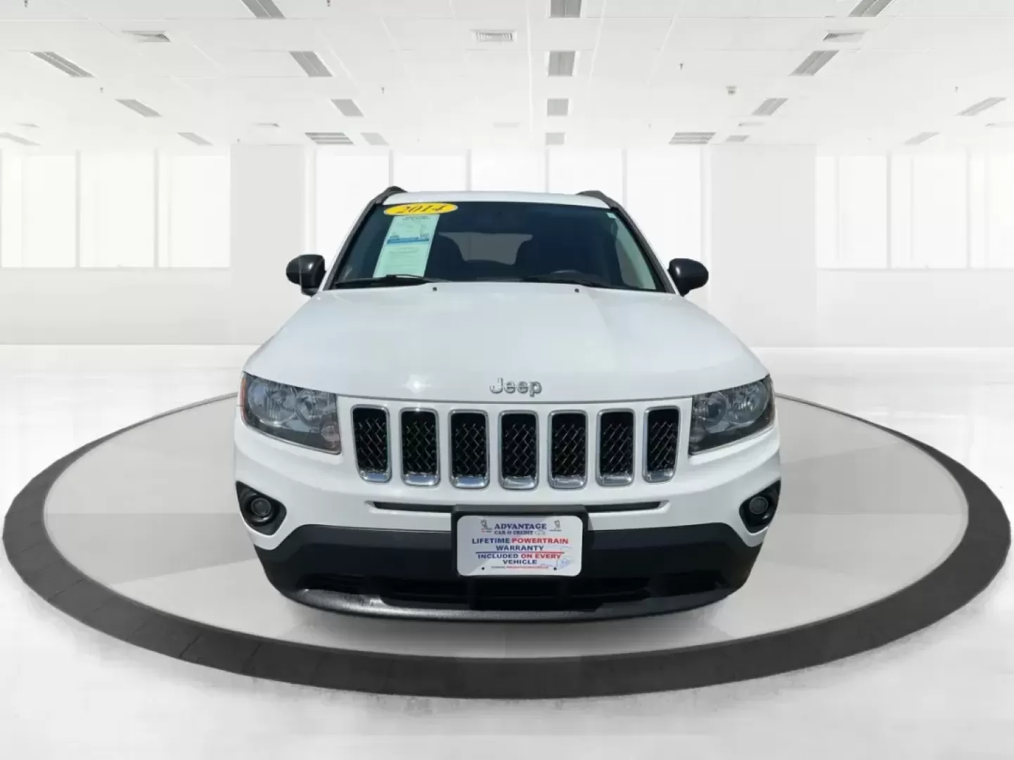 2014 Jeep Compass Sport (1C4NJDBB6ED) with an 2.4L I-4 DOHC engine, located at 401 Woodman Dr, Riverside, OH, 45431, (937) 908-9800, 39.760899, -84.123421 - Photo#6