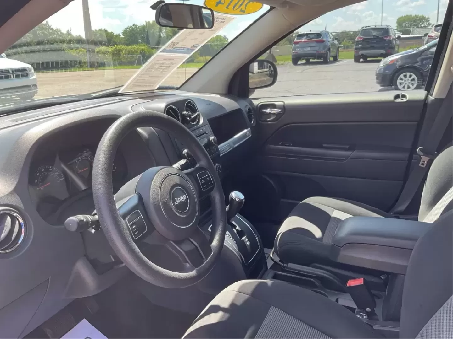 2014 Jeep Compass Sport (1C4NJDBB6ED) with an 2.4L I-4 DOHC engine, located at 401 Woodman Dr, Riverside, OH, 45431, (937) 908-9800, 39.760899, -84.123421 - Photo#8