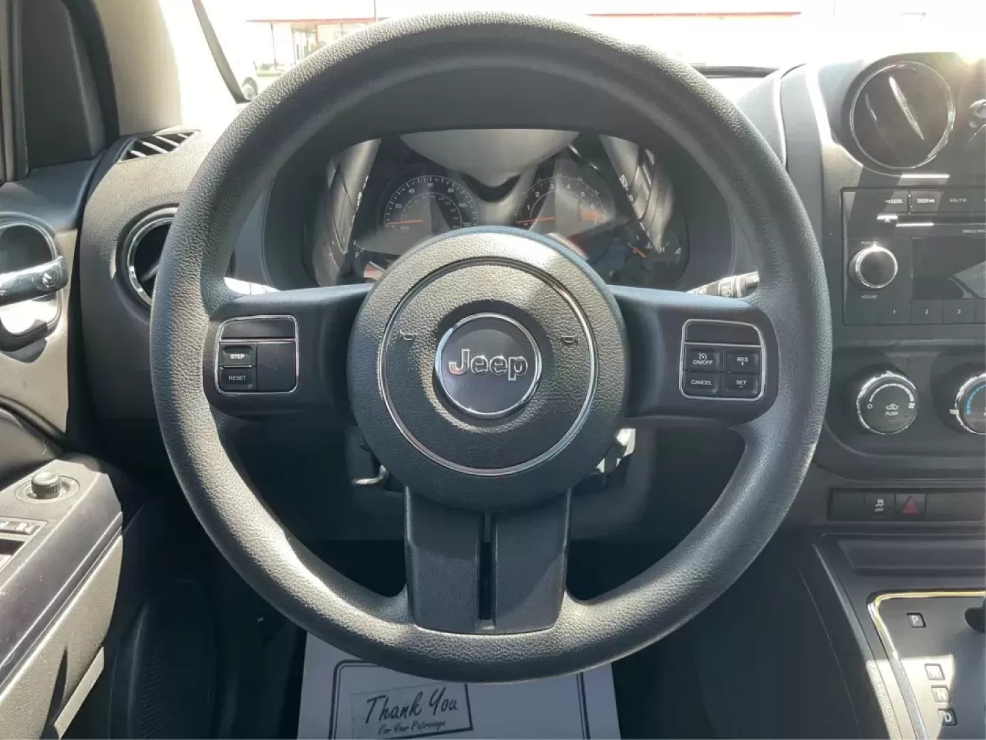 2014 Jeep Compass Sport (1C4NJDBB6ED) with an 2.4L I-4 DOHC engine, located at 401 Woodman Dr, Riverside, OH, 45431, (937) 908-9800, 39.760899, -84.123421 - Photo#15