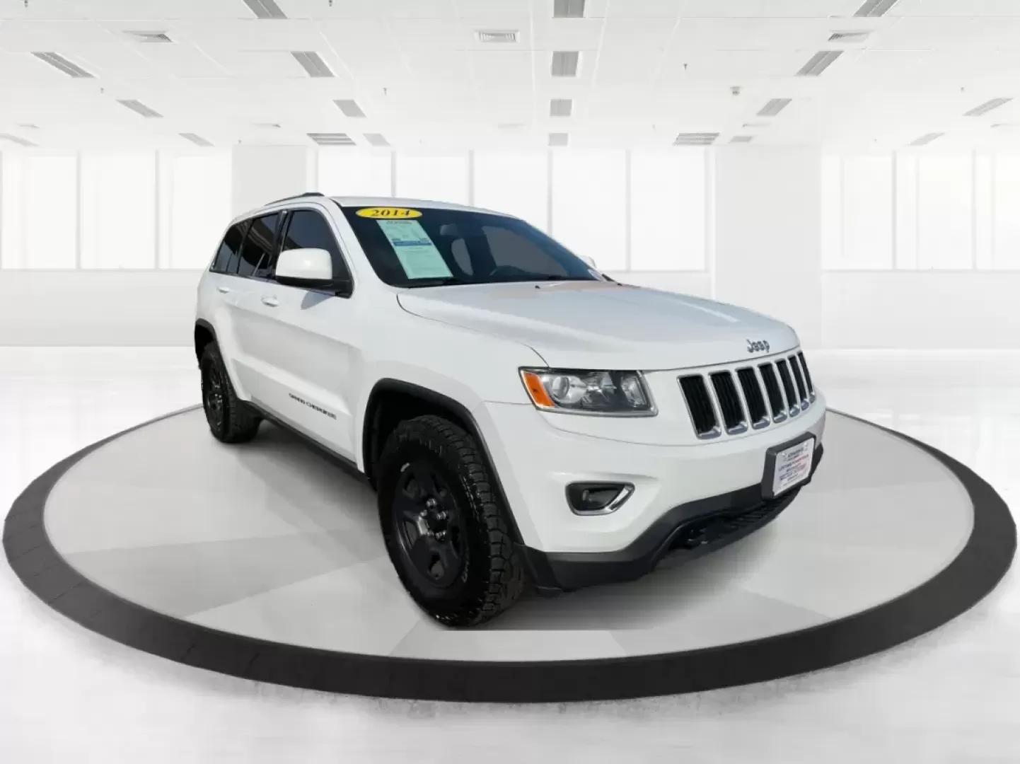 2014 Jeep Grand Cherokee Laredo (1C4RJFAGXEC) with an 3.6L V-6 DOHC engine, located at 1184 Kauffman Ave, Fairborn, OH, 45324, (937) 908-9800, 39.807072, -84.030914 - Photo#0