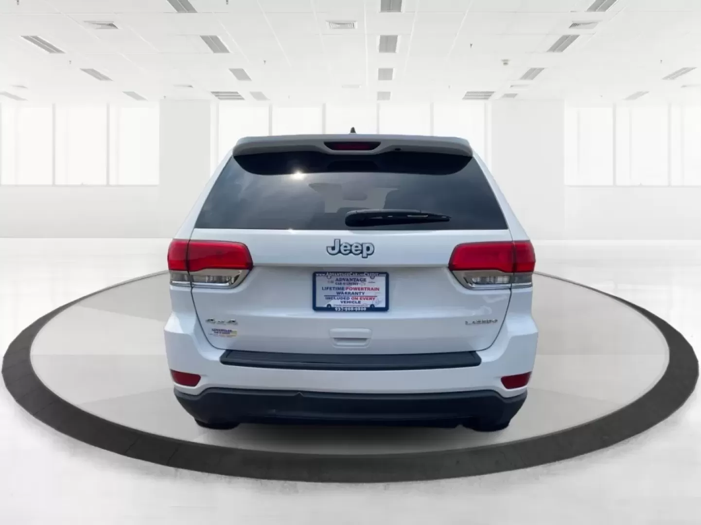 2014 Jeep Grand Cherokee Laredo (1C4RJFAGXEC) with an 3.6L V-6 DOHC engine, located at 1184 Kauffman Ave, Fairborn, OH, 45324, (937) 908-9800, 39.807072, -84.030914 - Photo#3