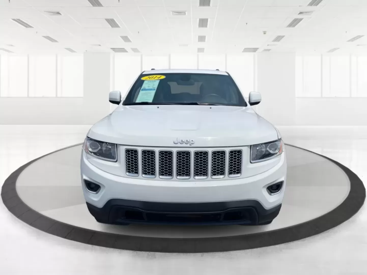 2014 Jeep Grand Cherokee Laredo (1C4RJFAGXEC) with an 3.6L V-6 DOHC engine, located at 1184 Kauffman Ave, Fairborn, OH, 45324, (937) 908-9800, 39.807072, -84.030914 - Photo#7