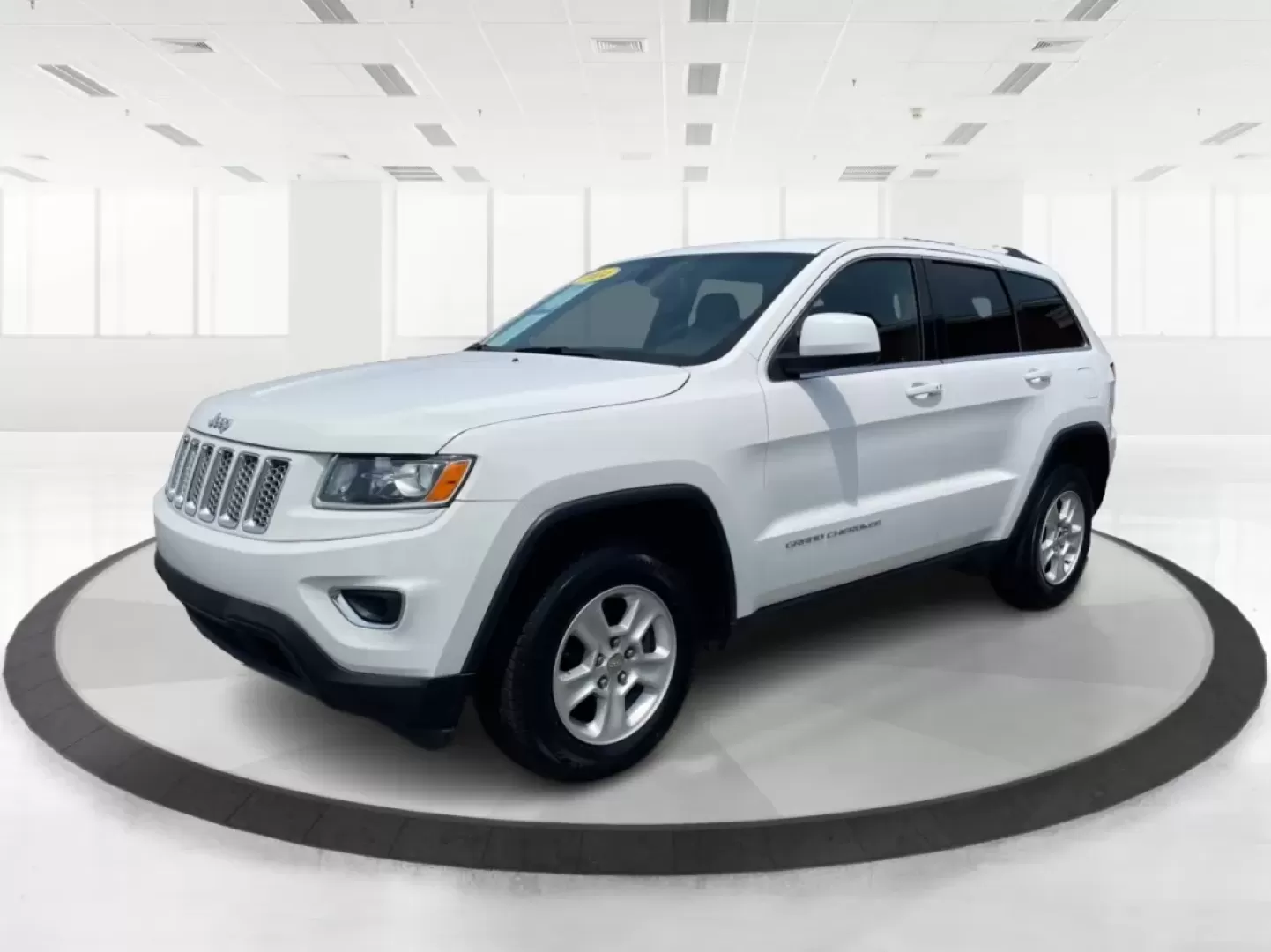 2014 Jeep Grand Cherokee Laredo (1C4RJFAGXEC) with an 3.6L V-6 DOHC engine, located at 1184 Kauffman Ave, Fairborn, OH, 45324, (937) 908-9800, 39.807072, -84.030914 - Photo#8