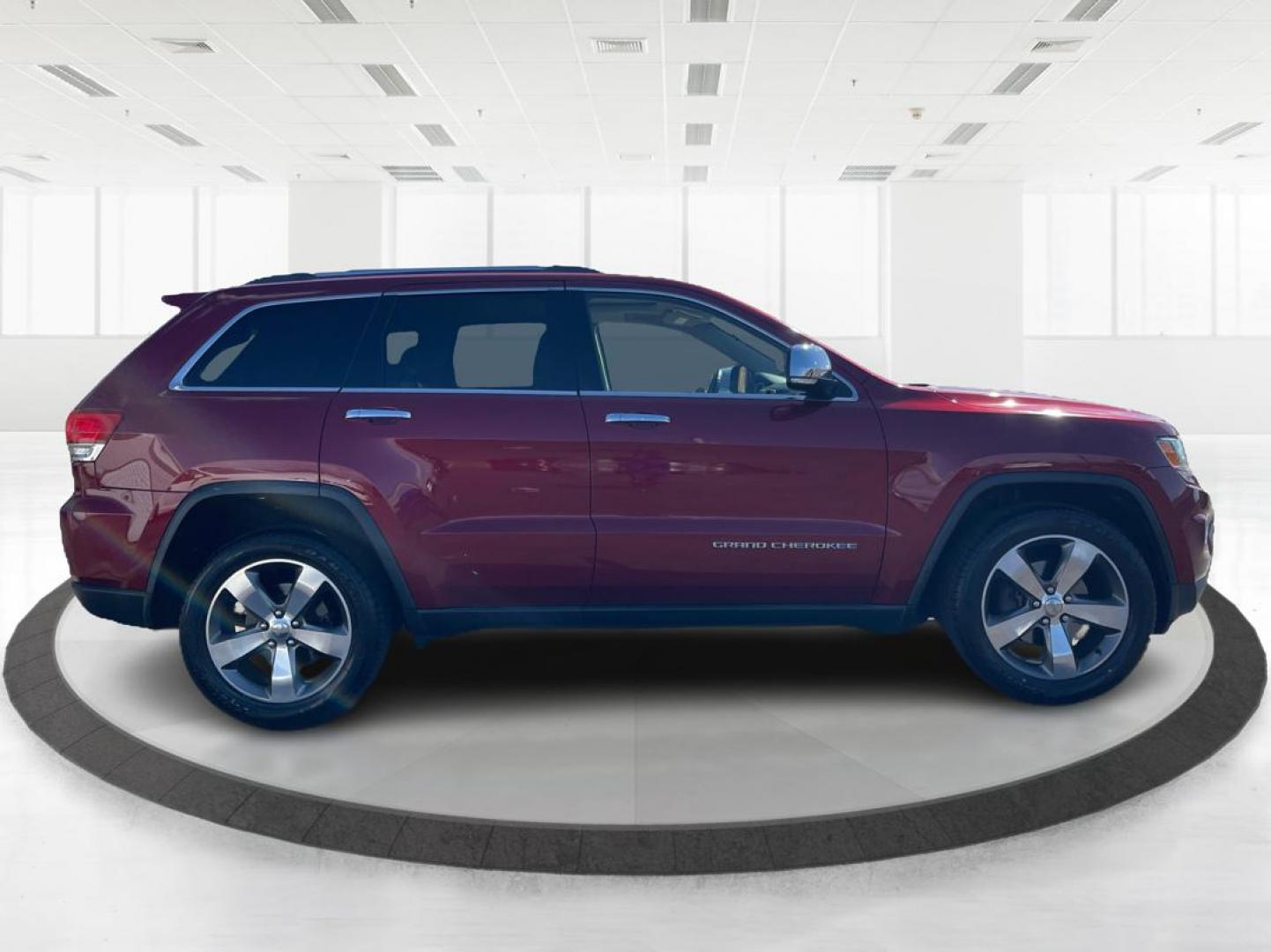 2014 Jeep Grand Cherokee Limited (1C4RJFBG5EC) with an 3.6L V-6 DOHC engine, located at 880 E. National Road, Vandalia, OH, 45377, (937) 908-9800, 39.891918, -84.183594 - Photo#1