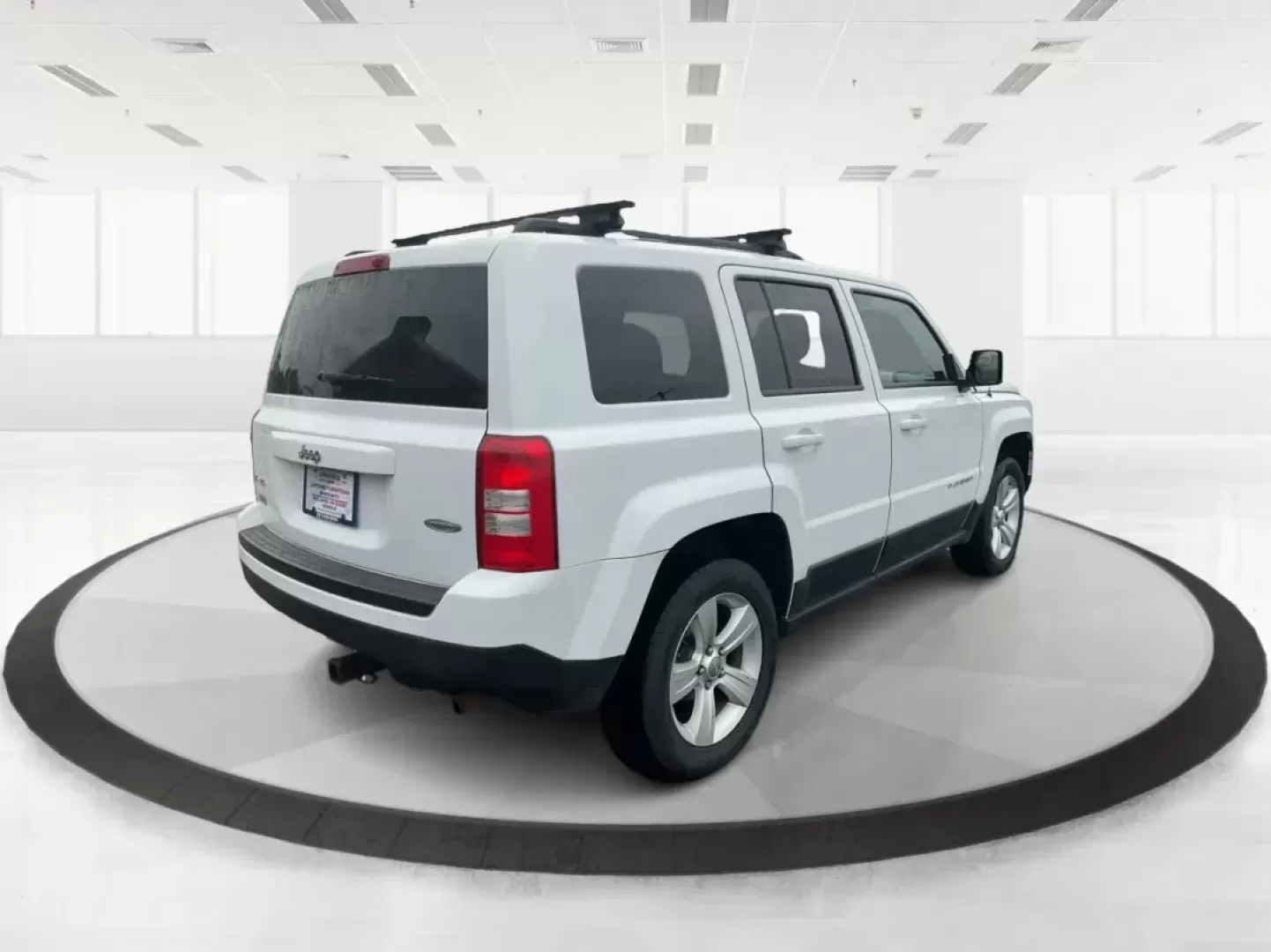 2014 Jeep Patriot Latitude (1C4NJRFB4ED) with an 2.4L I-4 DOHC engine, located at 1230 East Main St, Xenia, OH, 45385, (937) 908-9800, 39.688026, -83.910172 - Photo#1