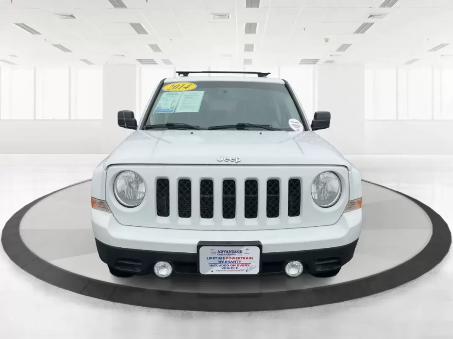 2014 Jeep Patriot Latitude (1C4NJRFB4ED) with an 2.4L I-4 DOHC engine, located at 1230 East Main St, Xenia, OH, 45385, (937) 908-9800, 39.688026, -83.910172 - Photo#6