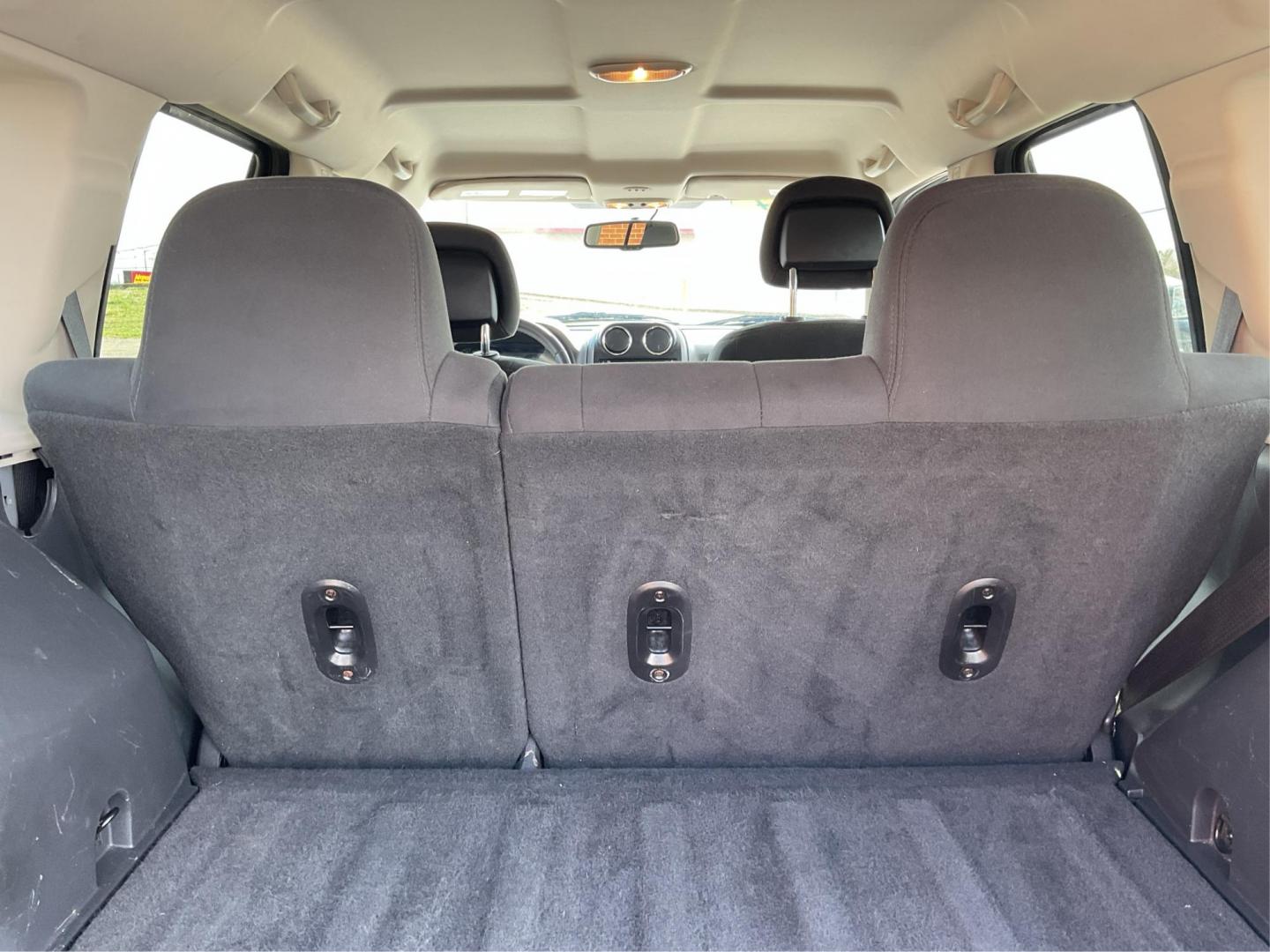2014 Bright Silver Metallic CC Jeep Patriot Latitude 2WD (1C4NJPFA5ED) with an 2.0L L4 DOHC 16V engine, located at 880 E. National Road, Vandalia, OH, 45377, (937) 908-9800, 39.891918, -84.183594 - Photo#9