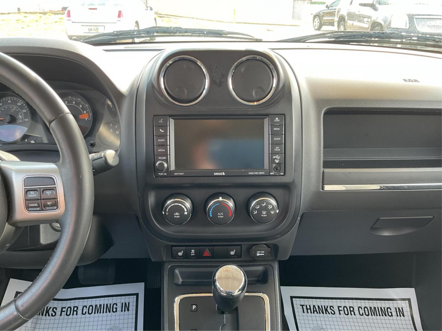 2014 Bright Silver Metallic CC Jeep Patriot Latitude 2WD (1C4NJPFA5ED) with an 2.0L L4 DOHC 16V engine, located at 880 E. National Road, Vandalia, OH, 45377, (937) 908-9800, 39.891918, -84.183594 - Photo#10