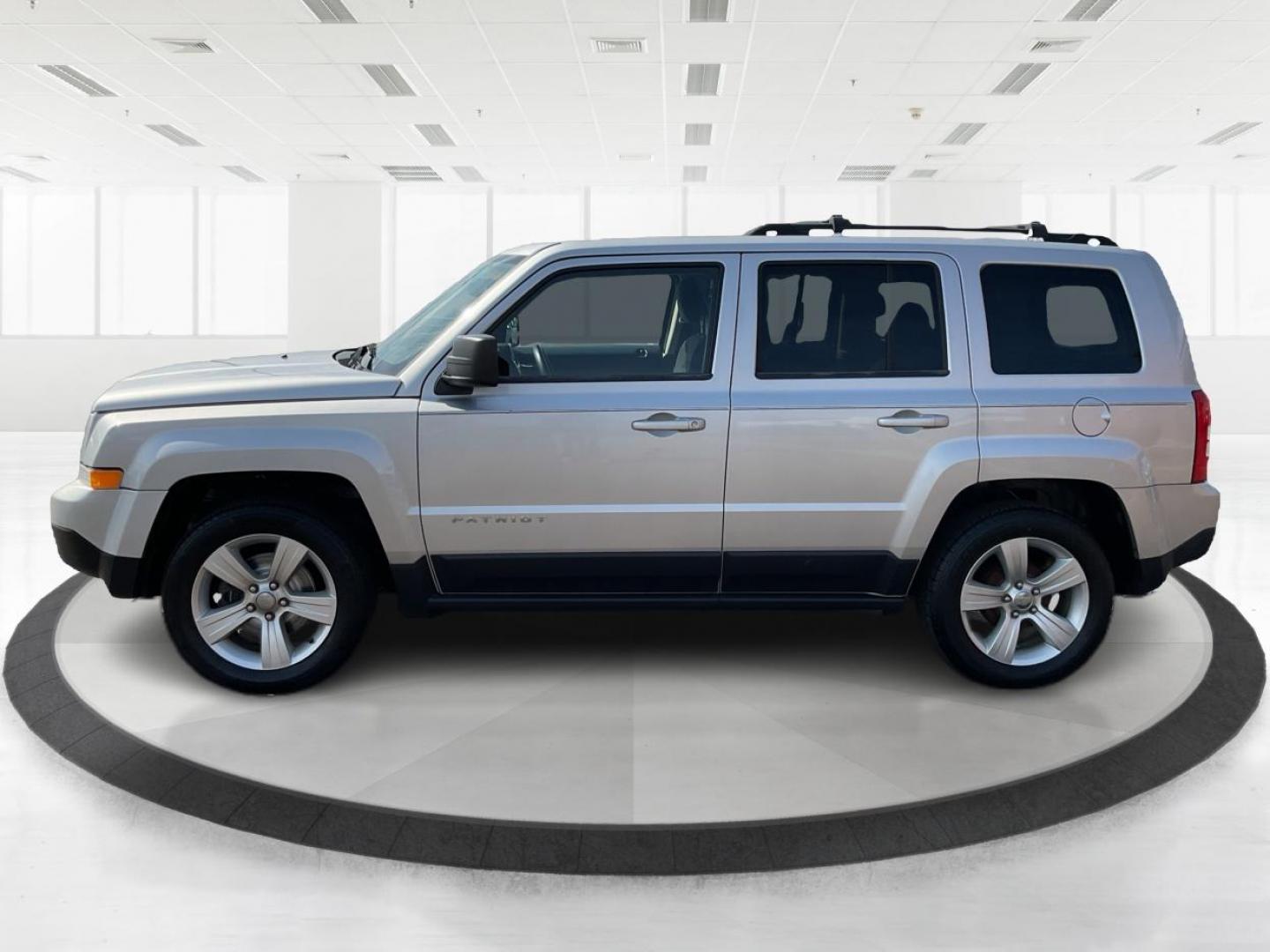 2014 Bright Silver Metallic CC Jeep Patriot Latitude 2WD (1C4NJPFA5ED) with an 2.0L L4 DOHC 16V engine, located at 880 E. National Road, Vandalia, OH, 45377, (937) 908-9800, 39.891918, -84.183594 - Photo#3