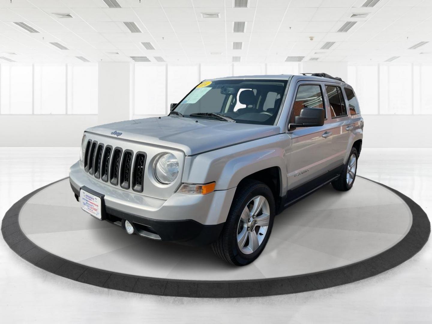 2014 Bright Silver Metallic CC Jeep Patriot Latitude 2WD (1C4NJPFA5ED) with an 2.0L L4 DOHC 16V engine, located at 880 E. National Road, Vandalia, OH, 45377, (937) 908-9800, 39.891918, -84.183594 - Photo#5