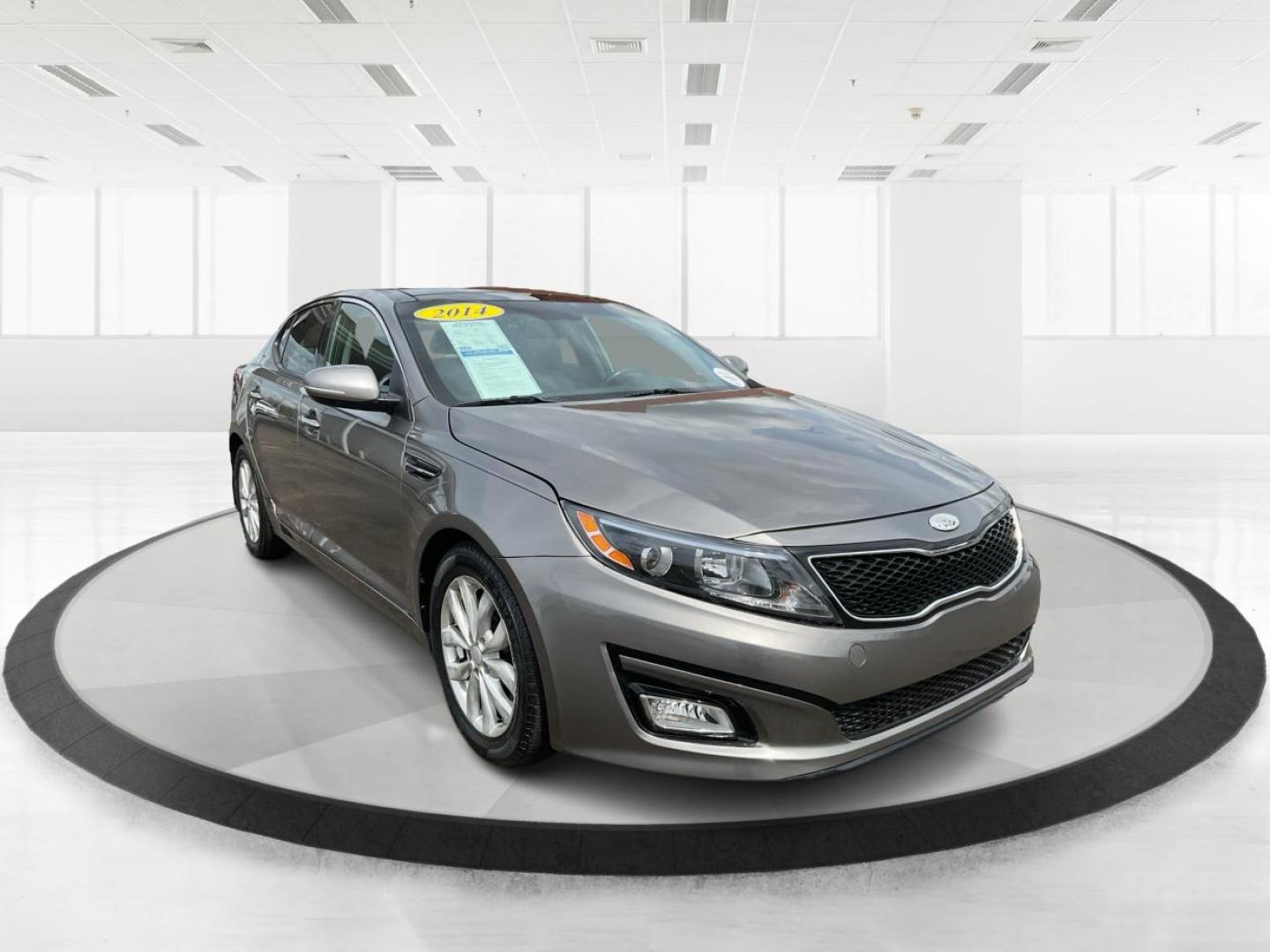 2014 Kia Optima EX (5XXGN4A76EG) with an Theta II 2.4L I-4 gasoline direct injection engine, located at 1184 Kauffman Ave, Fairborn, OH, 45324, (937) 908-9800, 39.807072, -84.030914 - Photo#0