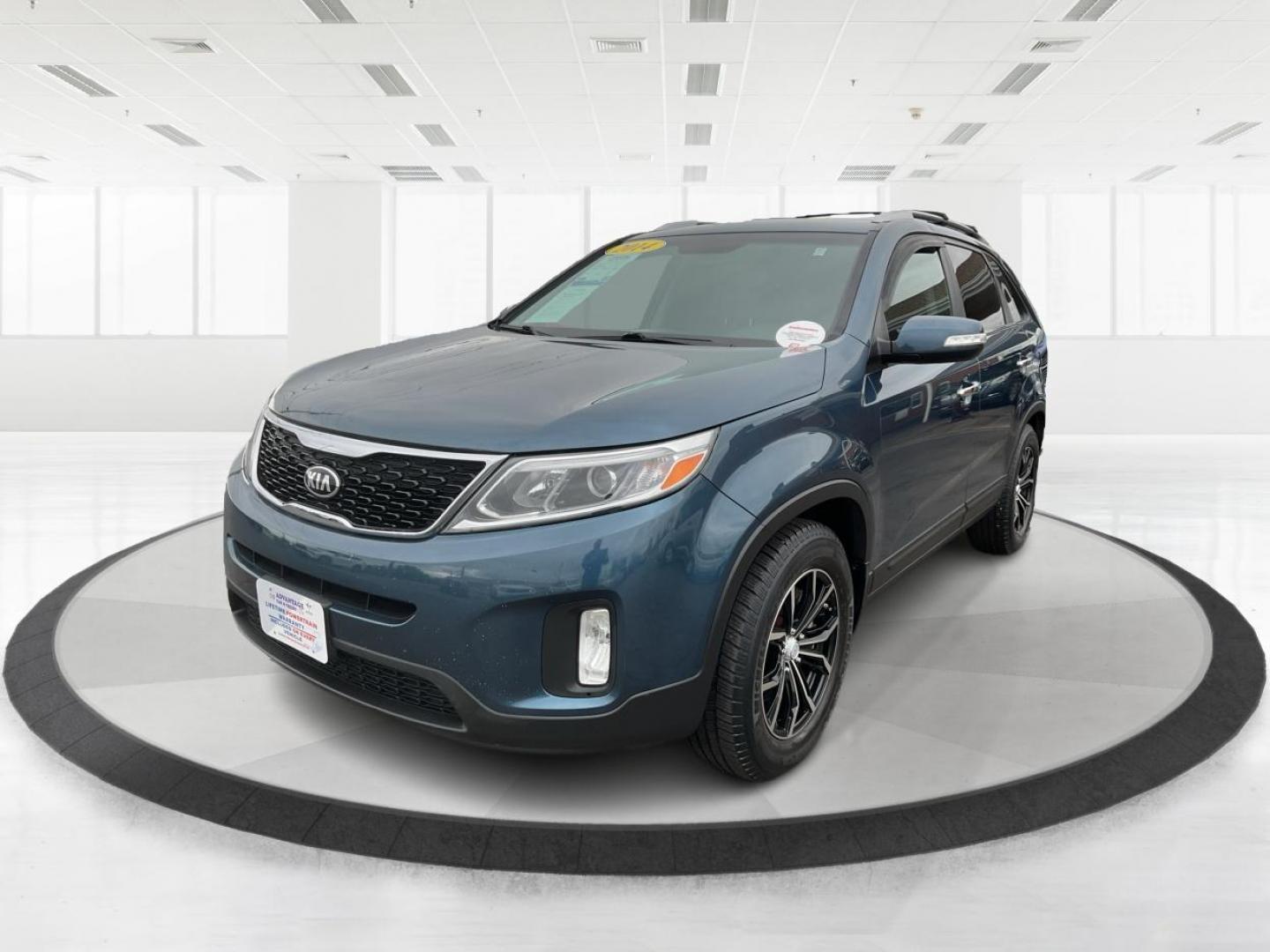 2014 Blue Kia Sorento LX 2WD (5XYKT3A64EG) with an 2.4L L4 DOHC 16V engine, 6-Speed Automatic transmission, located at 8750 N County Rd 25A, Piqua, OH, 45356, (937) 908-9800, 40.164391, -84.232513 - Photo#7