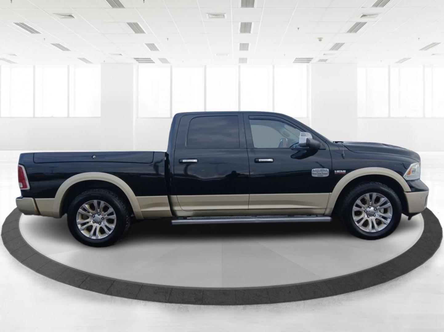 2014 Ram 1500 Laramie Longhorn Edition Crew Cab LWB 4WD (1C6RR7WT6ES) with an 5.7L V8 OHV 16V engine, 8-Speed Automatic transmission, located at 8750 N County Rd 25A, Piqua, OH, 45356, (937) 908-9800, 40.164391, -84.232513 - Photo#1